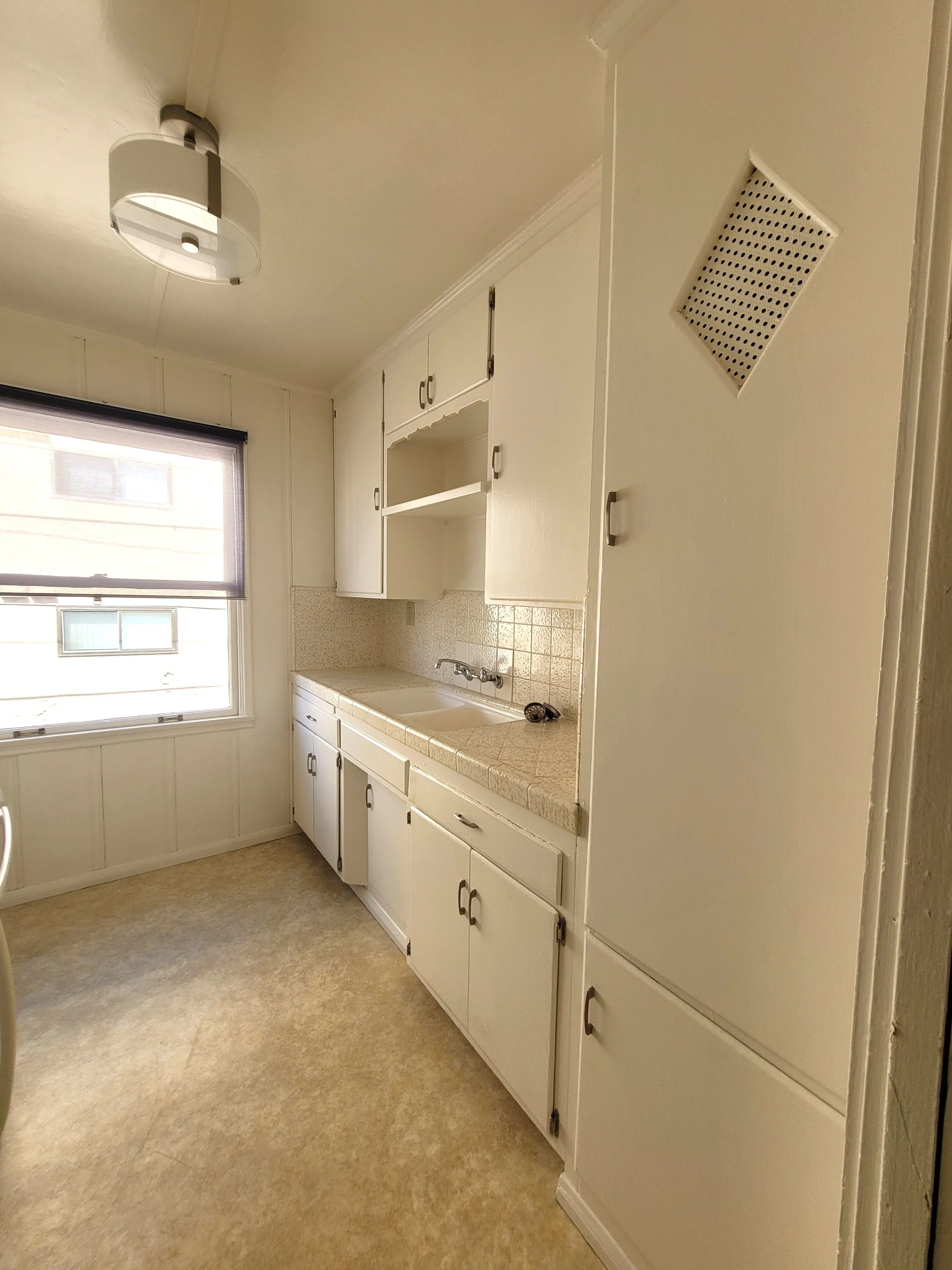 734 Emerald Kitchen Cabinets.jpg