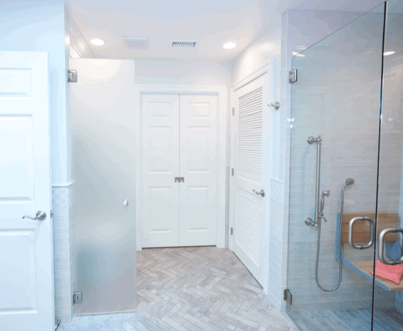 Since this was an addition to an existing home, the client was able to create a laundry closet in the bath area. This provides easy access for laundry with the closet just through the double doors.