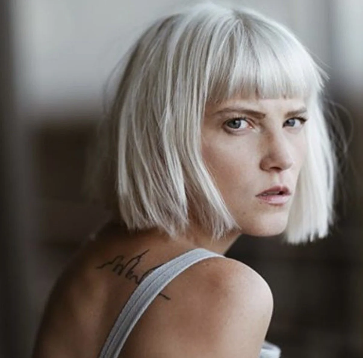 Cool-toned platinum blonde bob by Aiya Hair Salon in Santa Monica