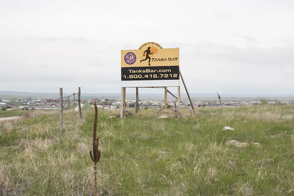 A Tanka Bar sign outside of the Tanka offices in Kyle, South Dakota.
