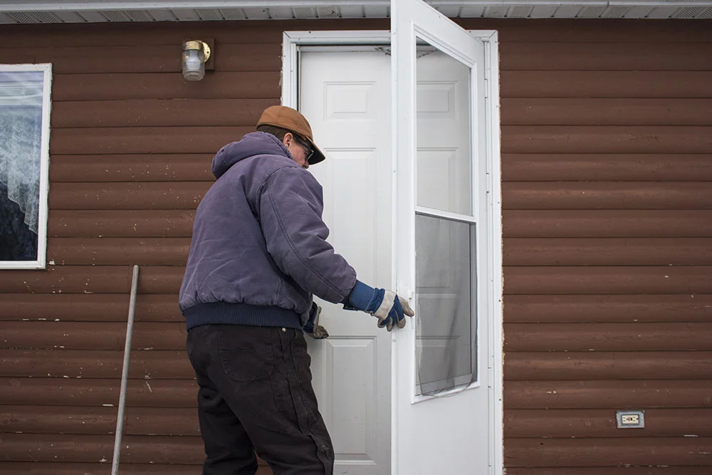Jim entering one of the cabins available for rent at the resort.