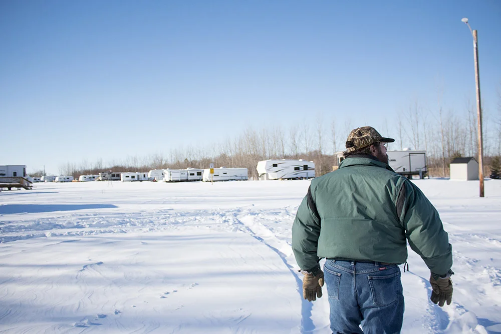 Rick walking through Six Mile Bay campground.