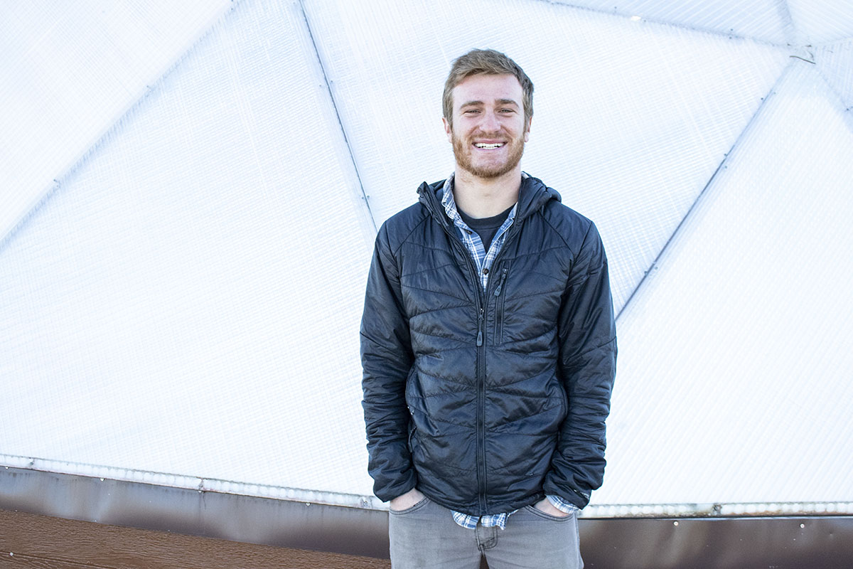 AmeriCorps VISTA member Aaron Mandell at the Keya Wakpala Garden, in South Central South Dakota, on the Rosebud Reservation.