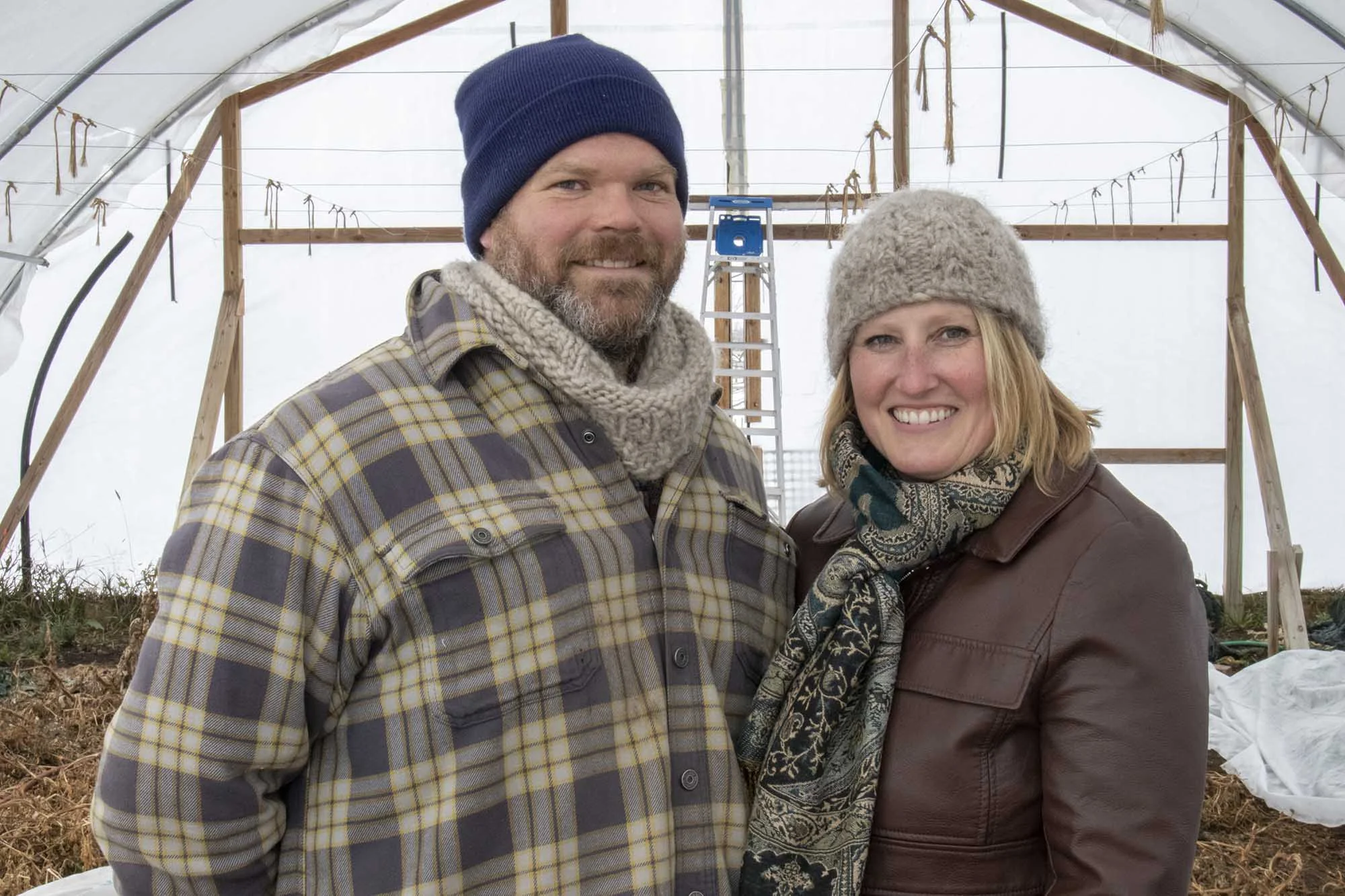 Matt and Lindy Geraets standing in their greenhouse about 20 miles east of Pierre, South Dakota.