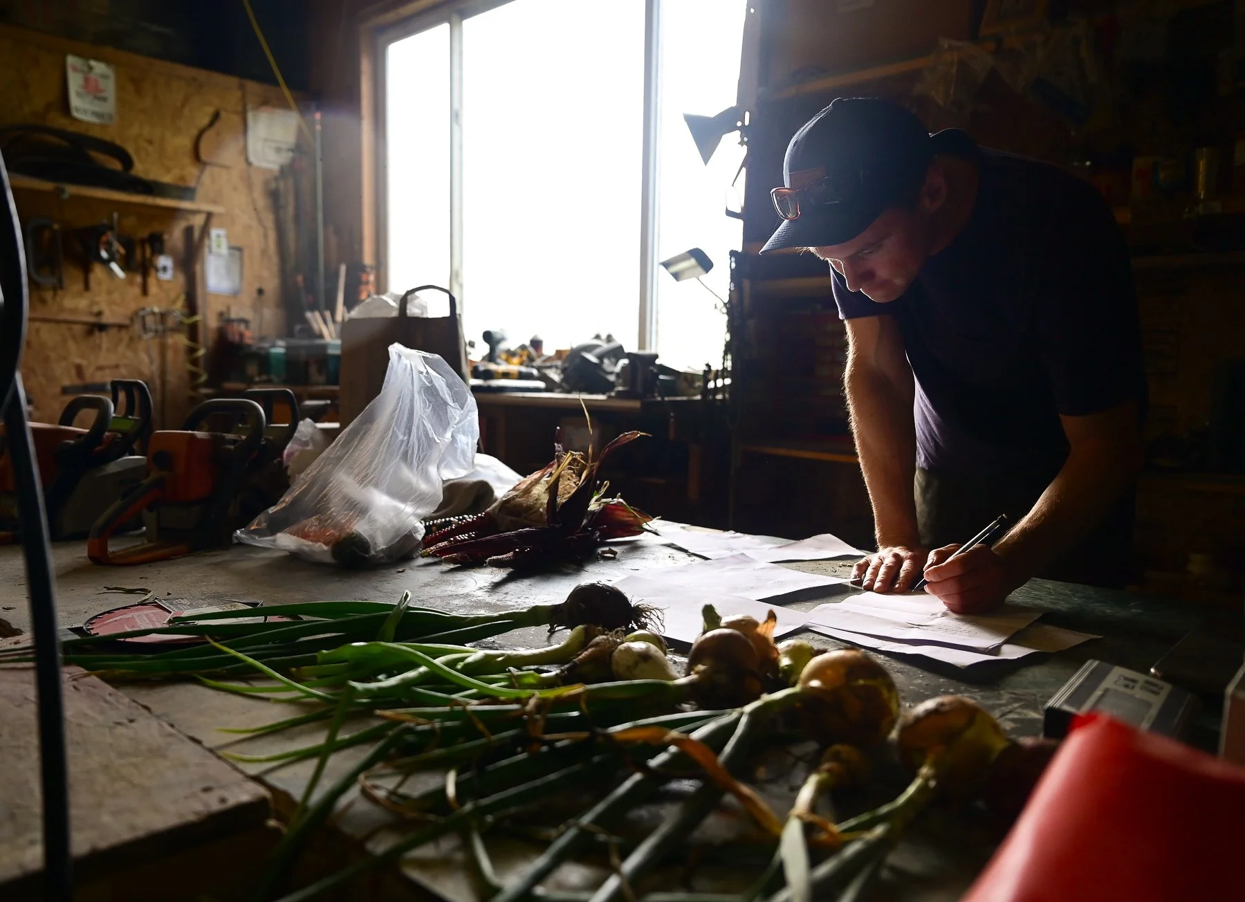 Cameron Skinner does paper work for his farm out of a garage on his mothers property outside of Big Timber, MT.  