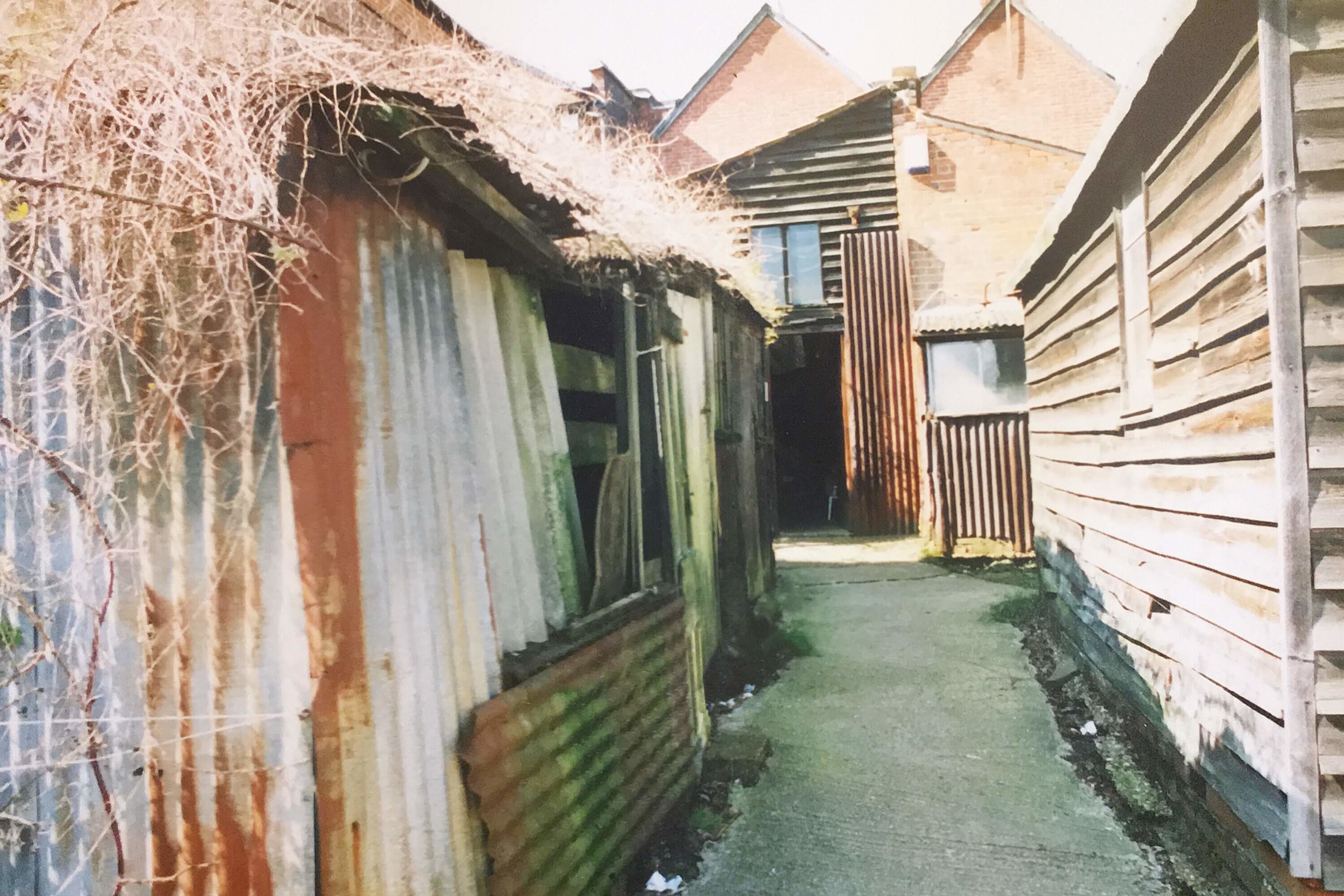 The old sheds in the yard including outside loo!
