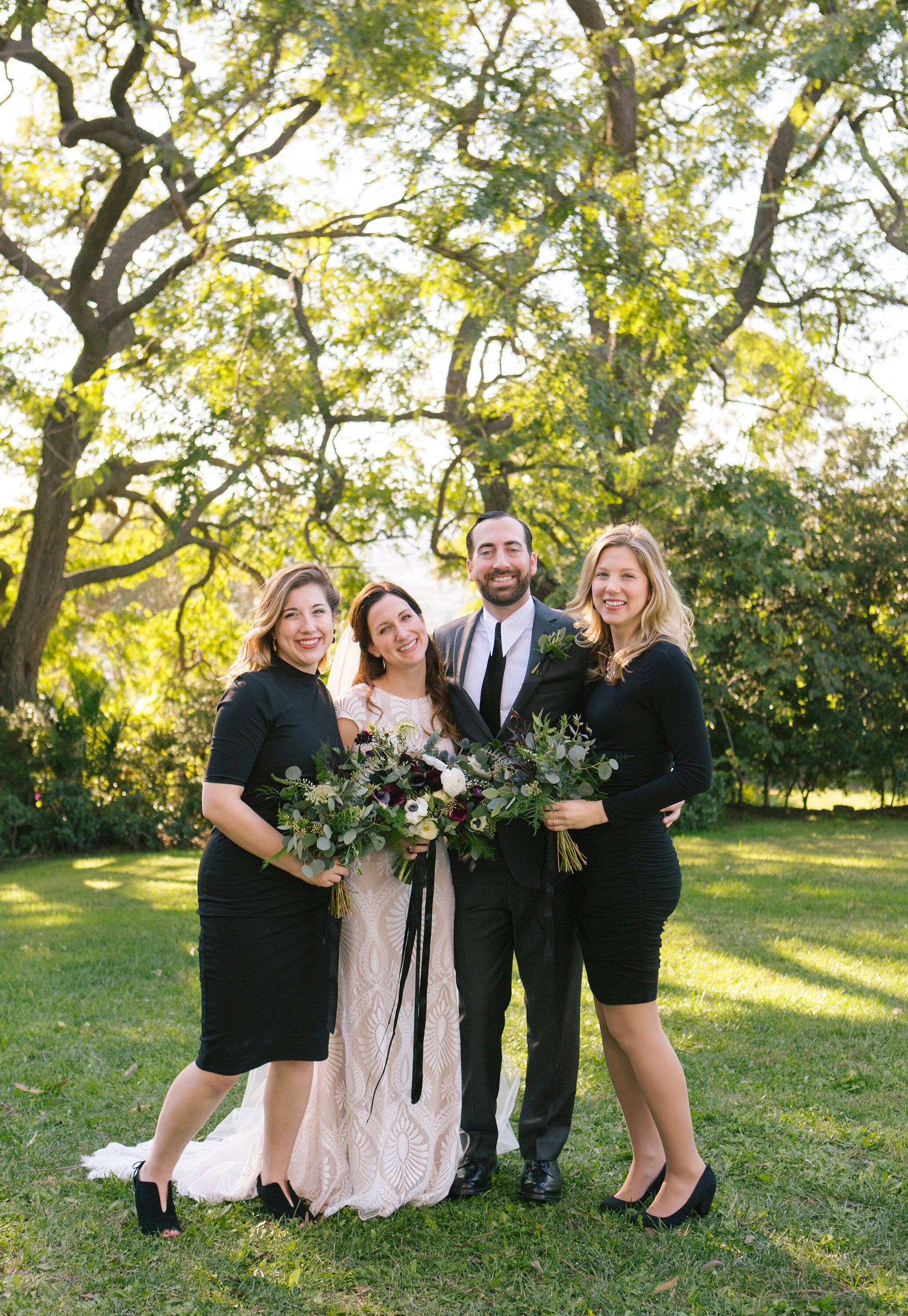 Lorie & Adam with bridesmaids- Photo by Rainbeau Tharp
