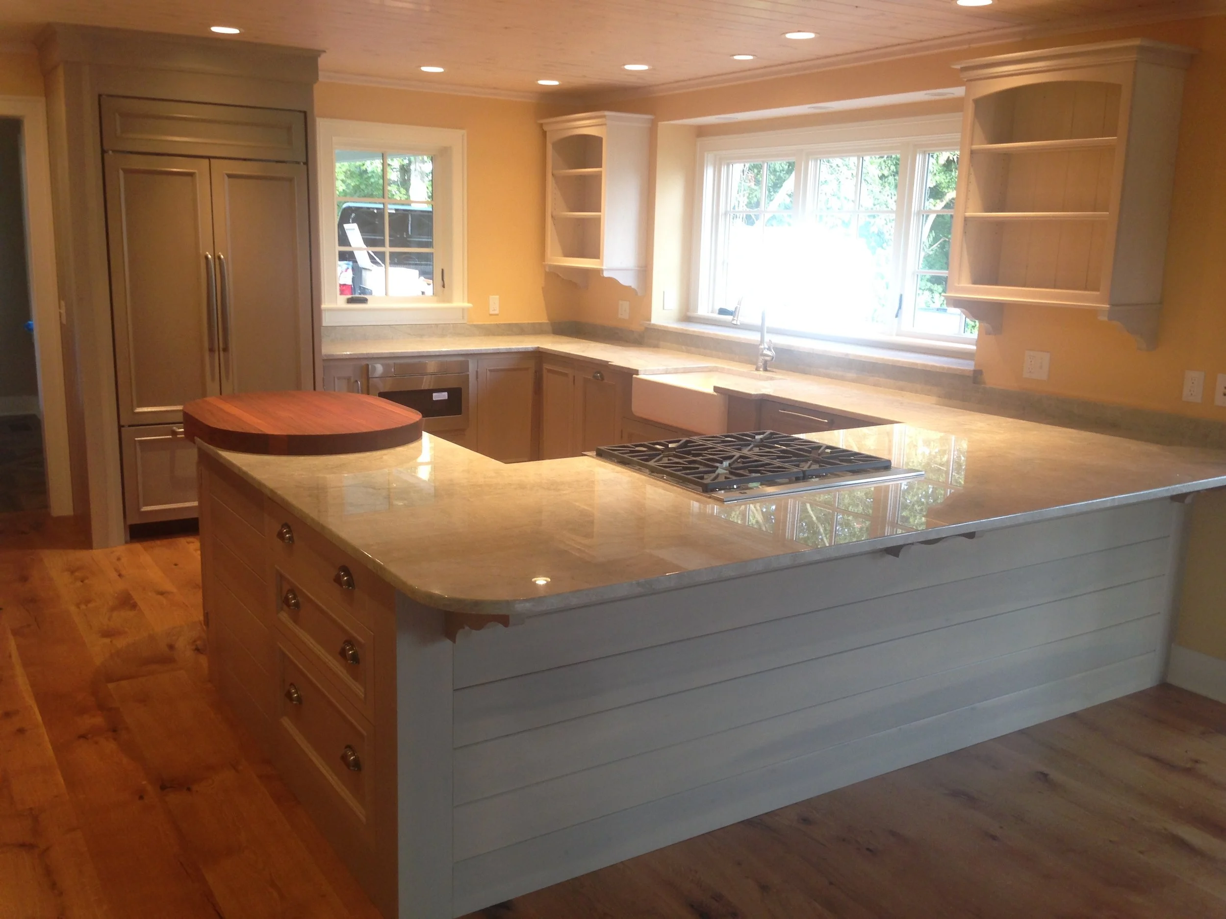 A Cottage Kitchen In Semi Transparent Sage Lacquer Quartzite