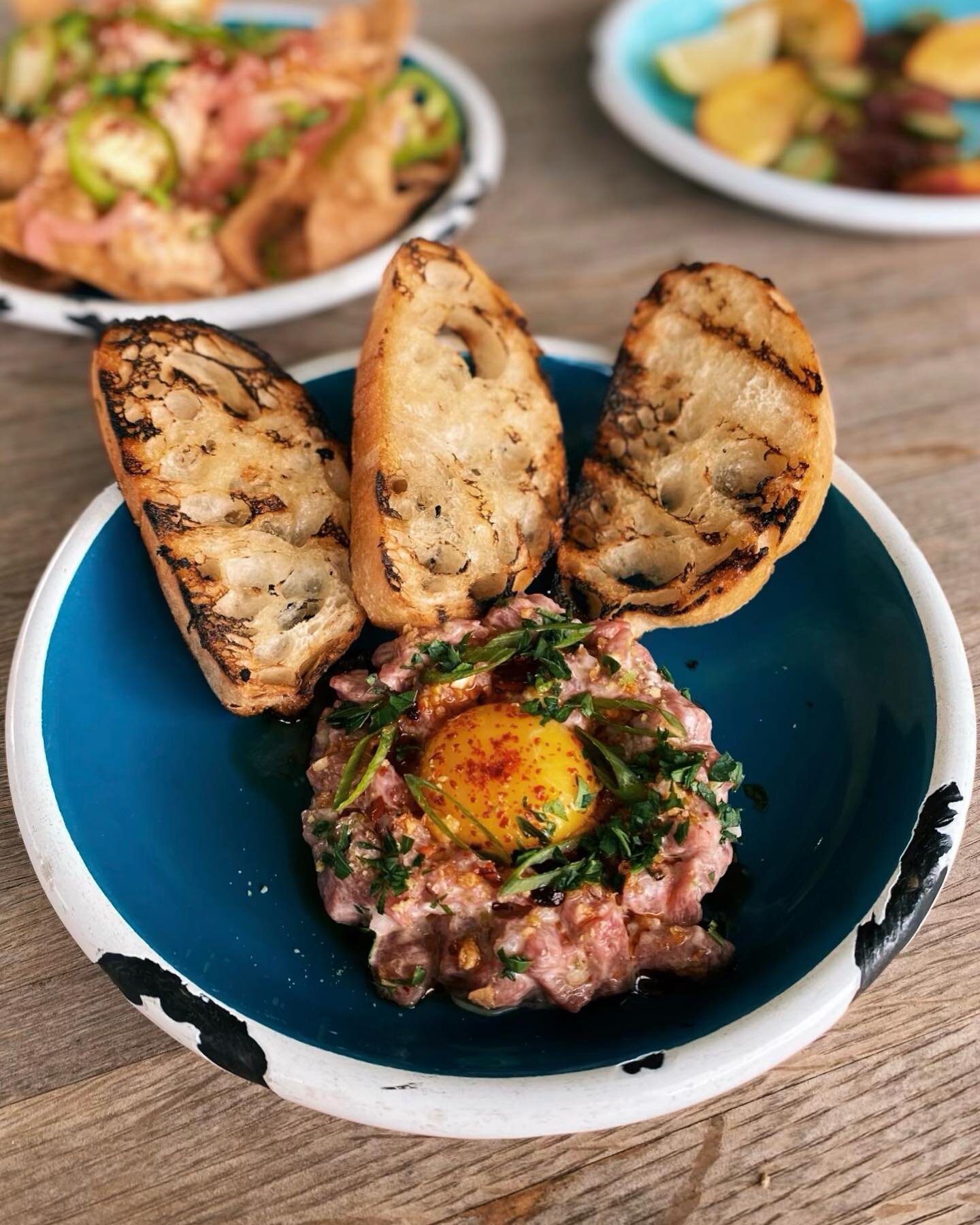 Why sit in 5 o&rsquo;clock traffic when you could be sitting with beef tartare and 1/2 off bottles of wine?! Wednesday Night Raw starts NOW, and happy hour ends at 6pm! #comeandgetit #tasteslikegoodtimes #beeftartare #happyhour #winewednesday