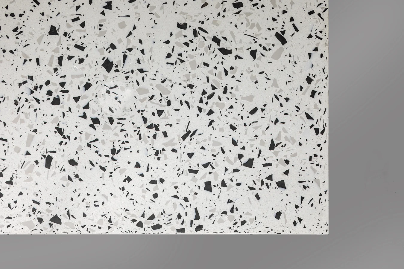 White Terrazzo stone with grey & black surface