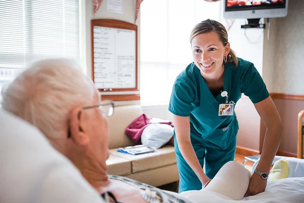 Nurse-Wrapping-Knee-of-Patient-M.jpg