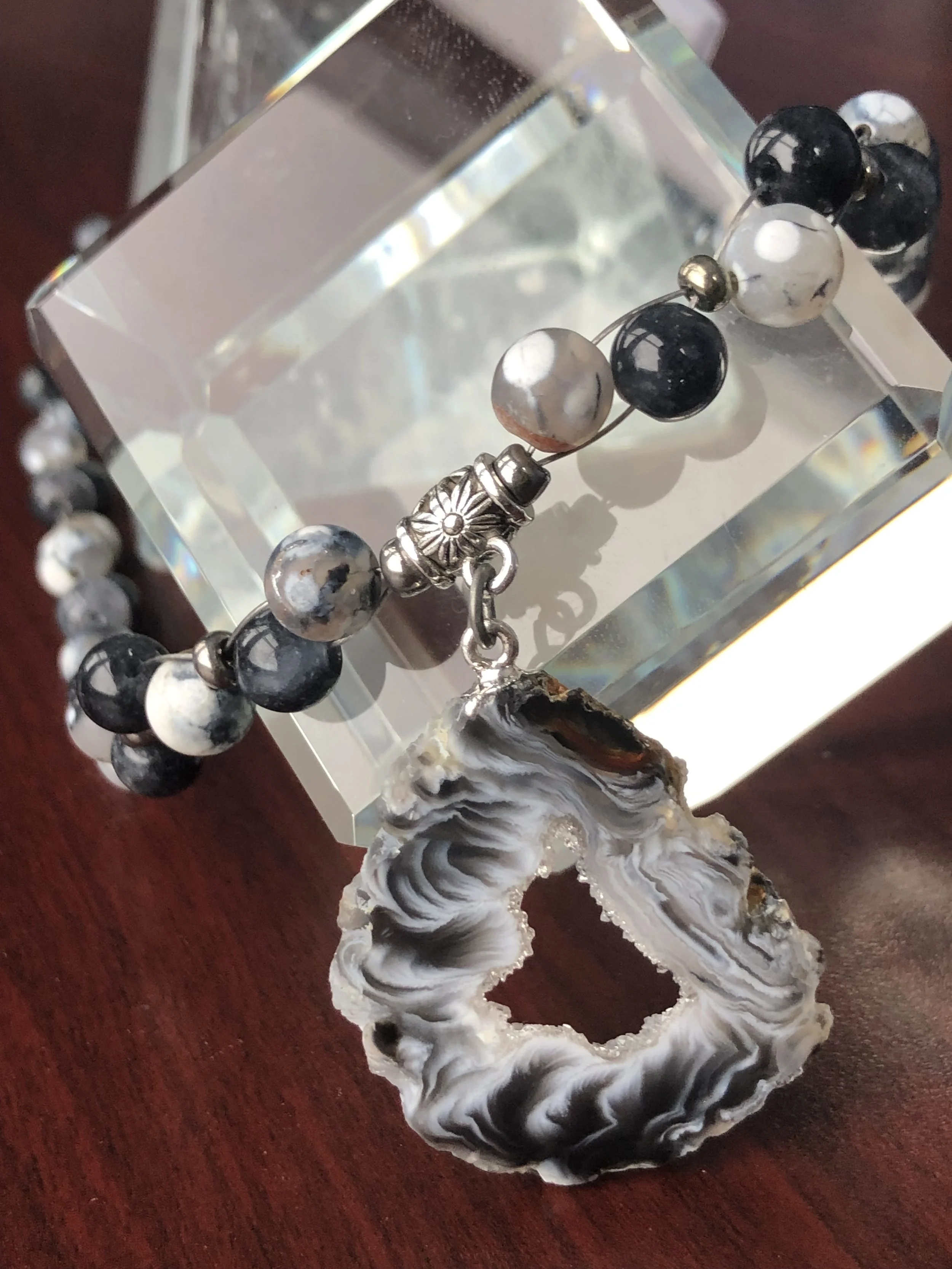 agate slice necklace on desk.JPG