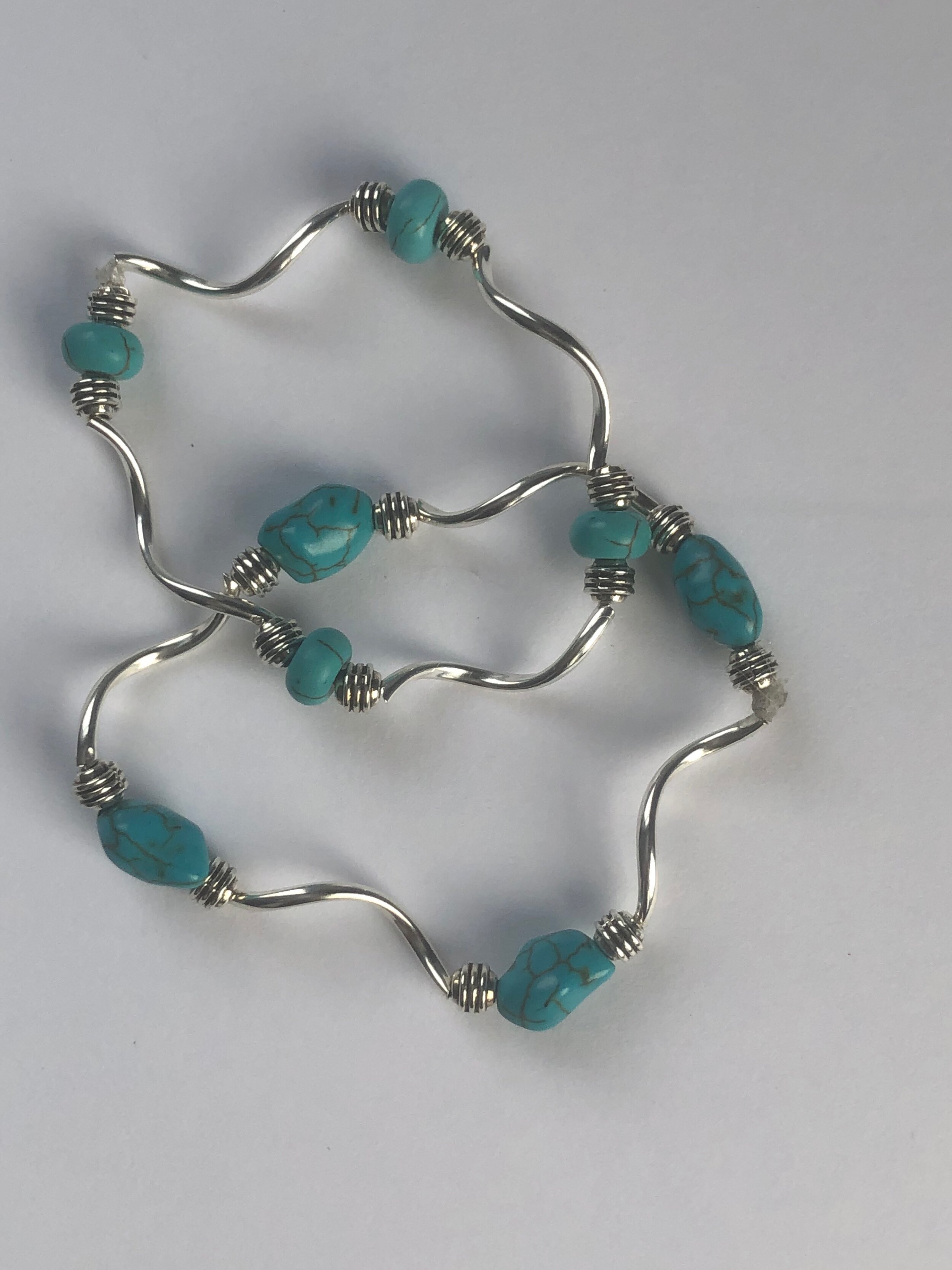 Silver and turquoise stretch bracelets.JPG