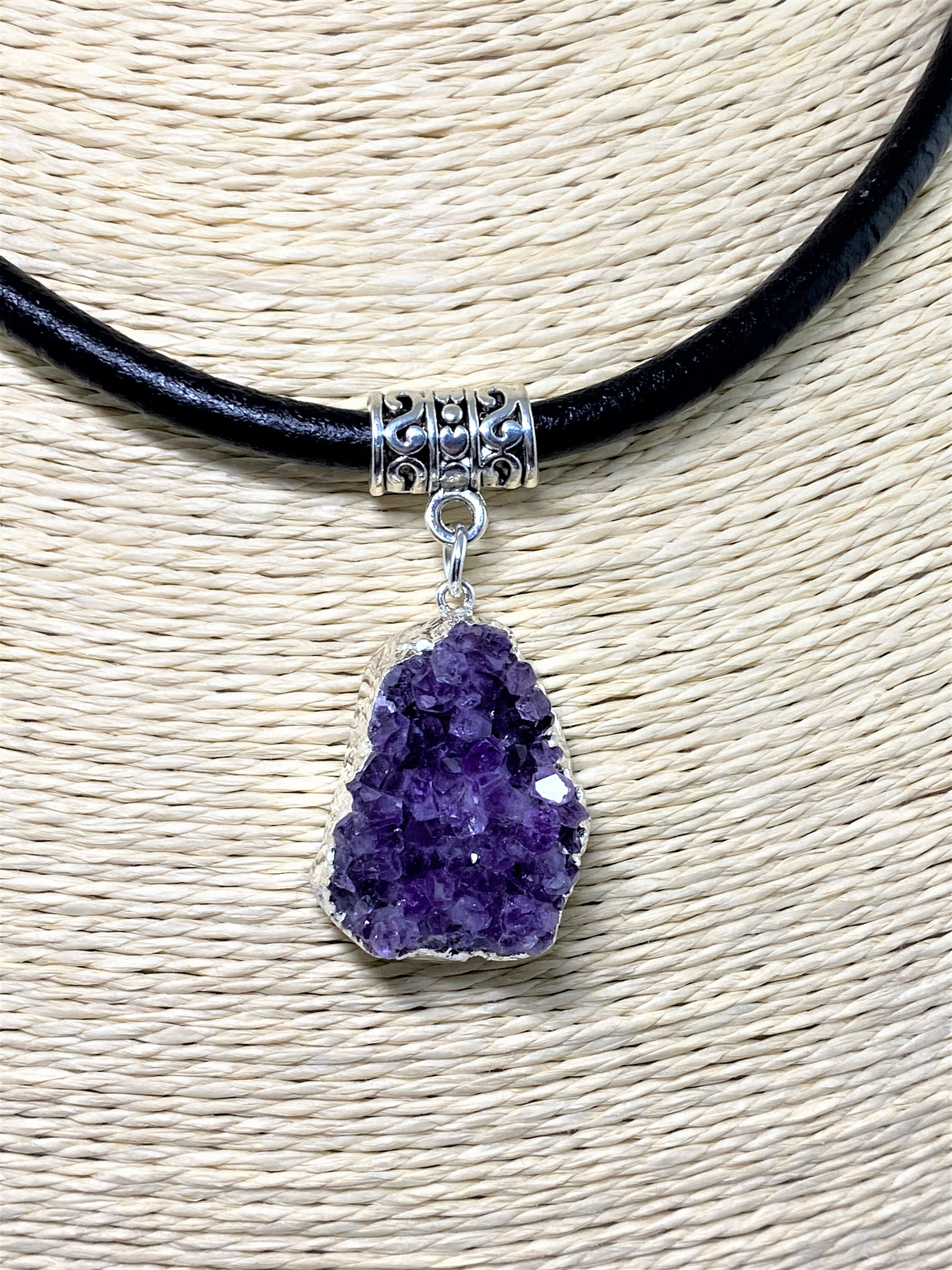 Raw Amethyst on Black Leather