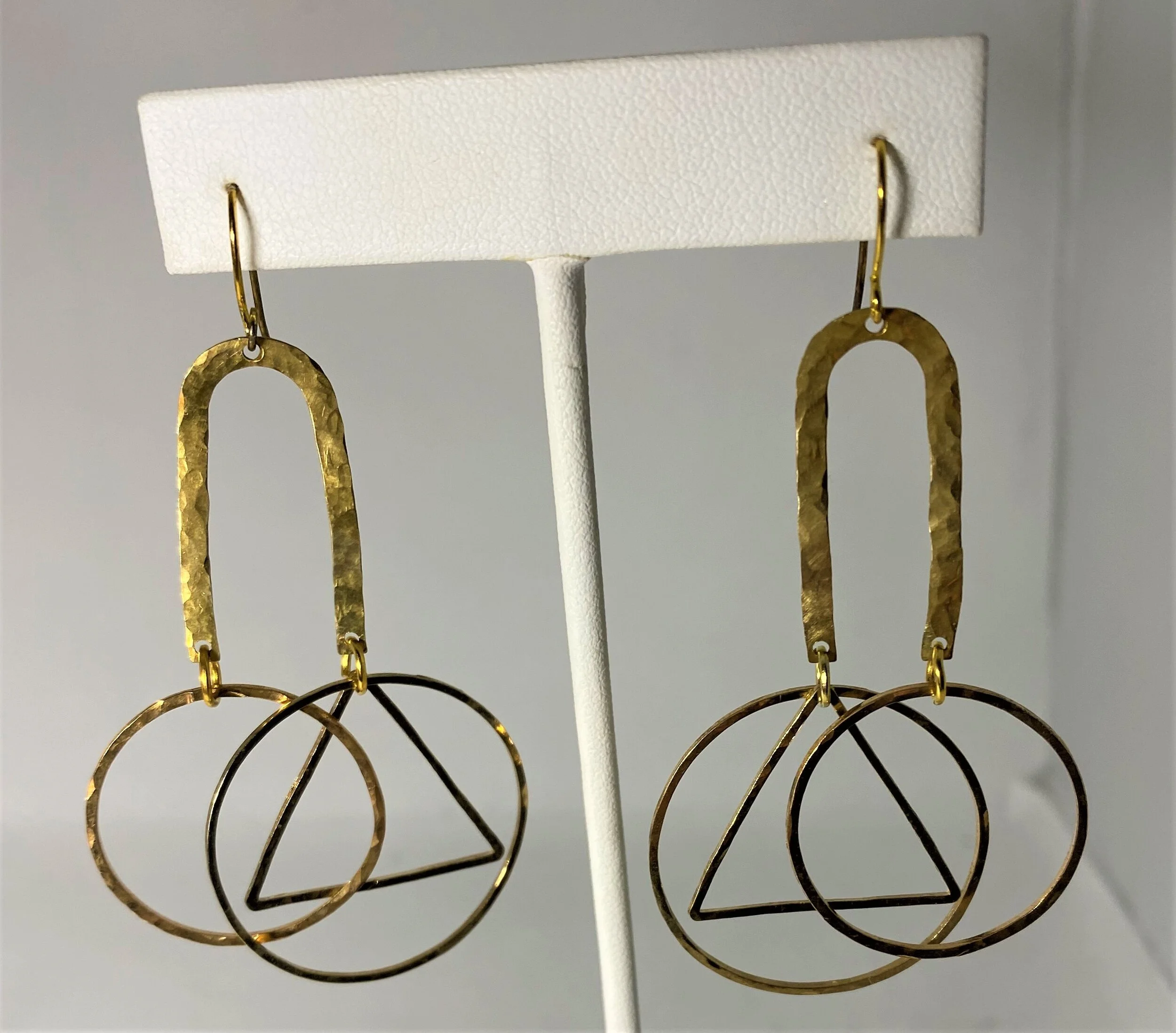 Architectural earrings on stand.jpg