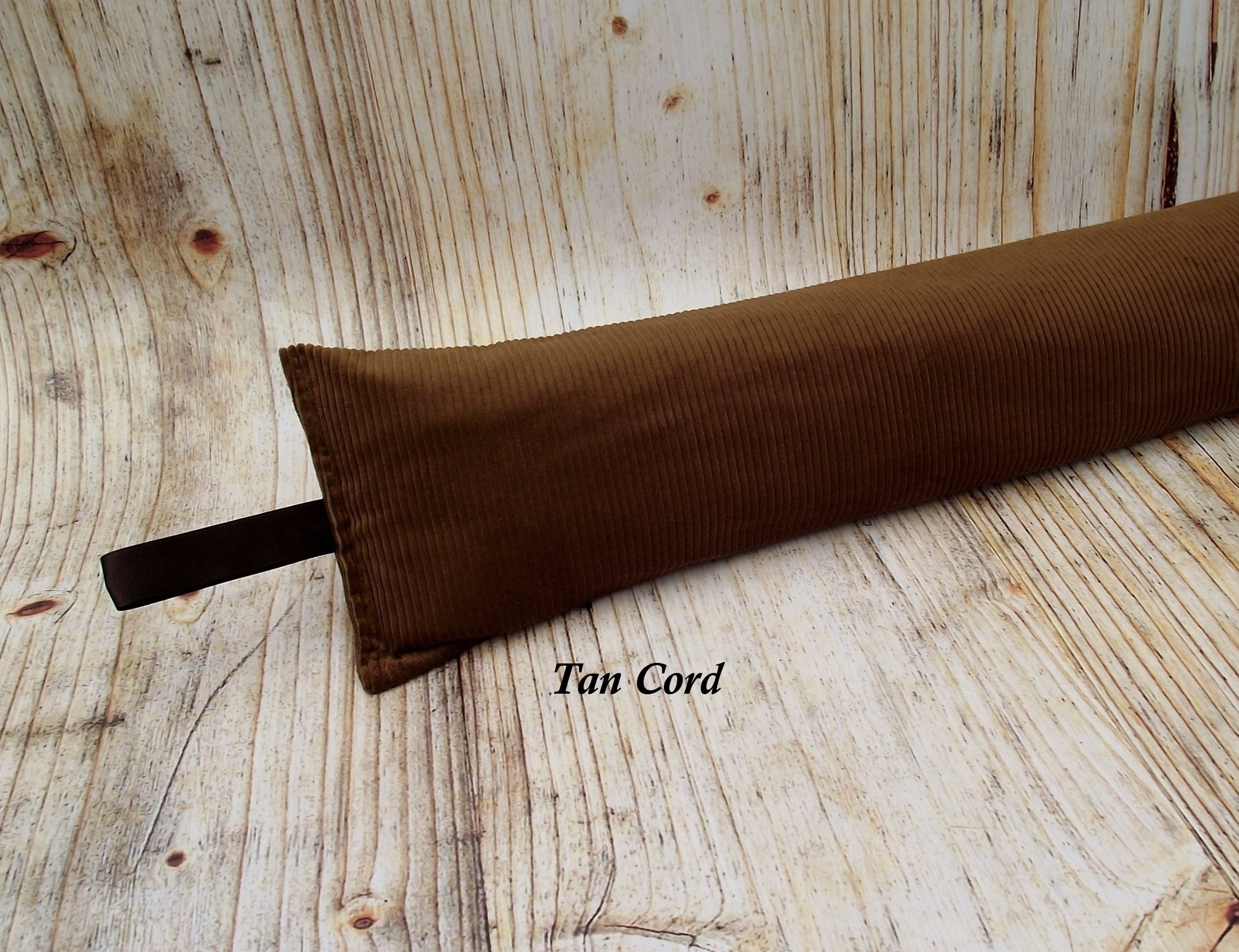 Tan cord draught excluder.JPG