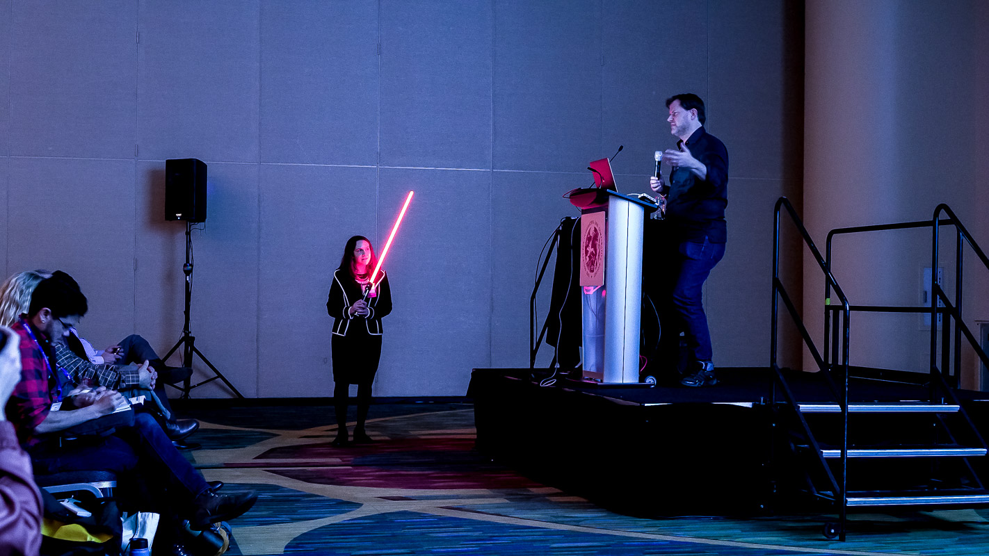  A lightsaber was used to keep the speakers on time, including Glen McIntosh (right), an Animation Director at Industrial Light &amp; Magic.  