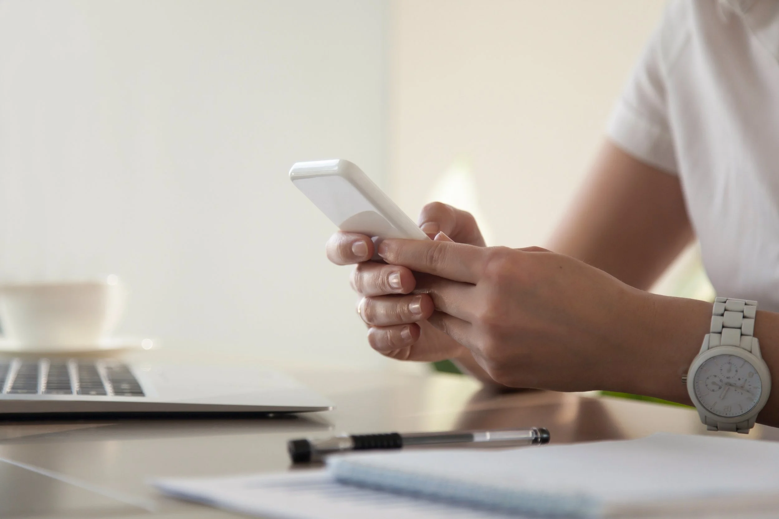 businesswoman-looking-important-contact-phone.jpg