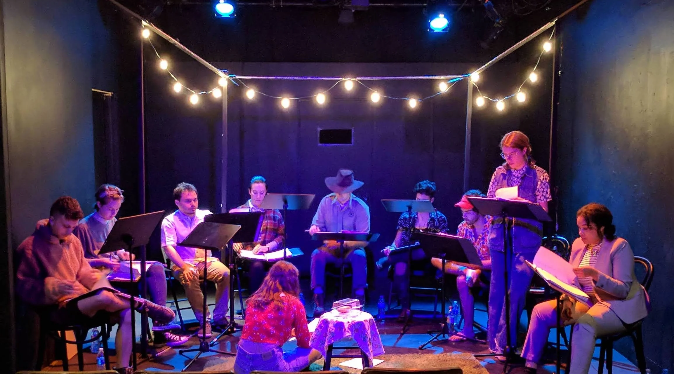 Brandon Blum, Kat Devoe-Peterson, Luke Medina, Julia Finch, Conor Murphy, Victoria Ortiz, Tyler Bremer, Meg Cashel, Taylor Bennett, and Rosie Glen-Lambert in tech for The Last Croissant staged reading at VS Theatre. (co-produced with Inkwell Theatre as part of the Inkwell Development Lab)