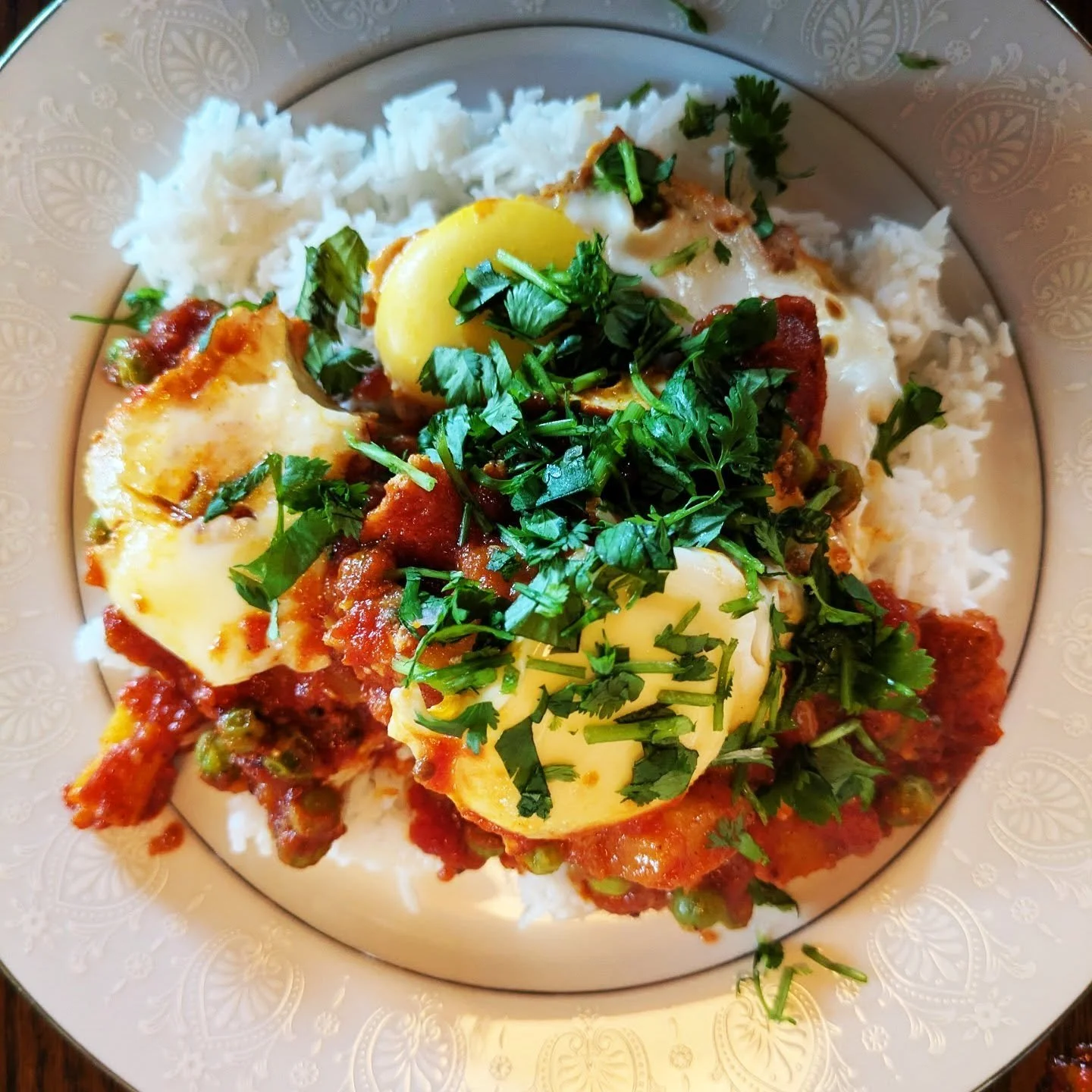 Parsi Eggs. My summer of learning to cook Indian food continues. I am experiencing new things like: Popping mustard seeds in oil is very satisfying. Freshly ground toasted cumin seeds smell amazing... I decided to buy one of the books that I borrowed