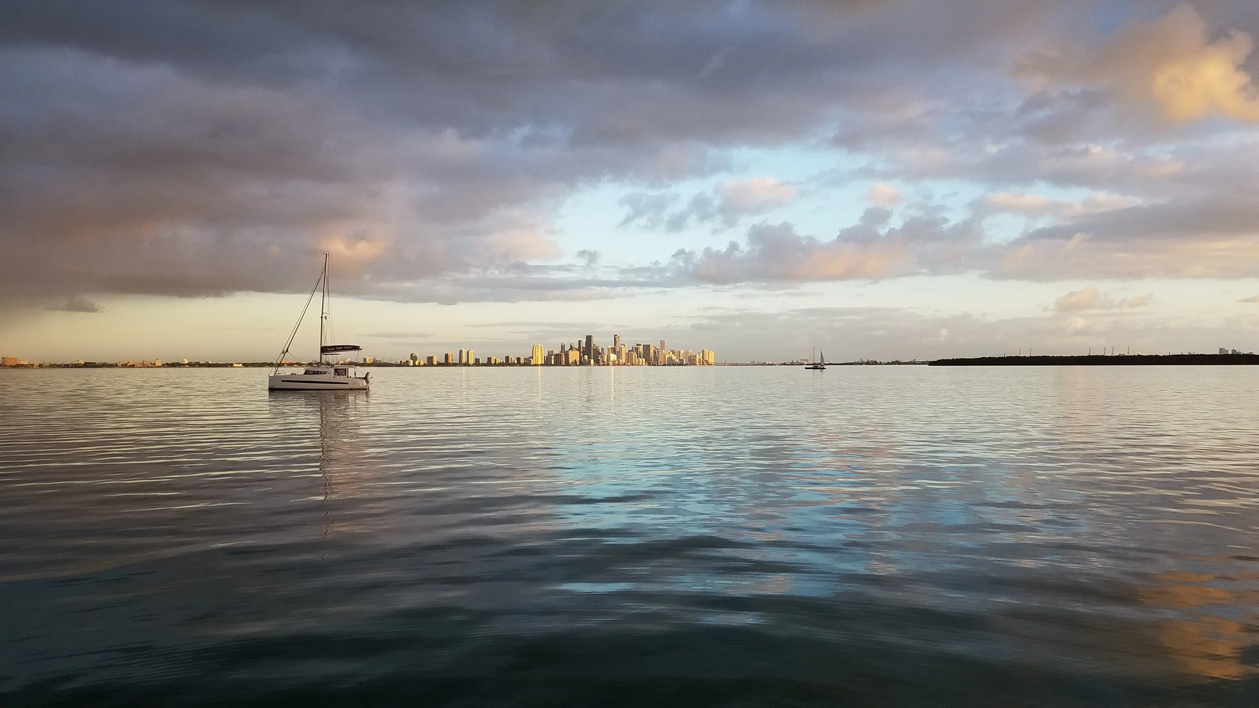 Early morning views of the Miami skyline while anchored in Biscayne Bay after the rain