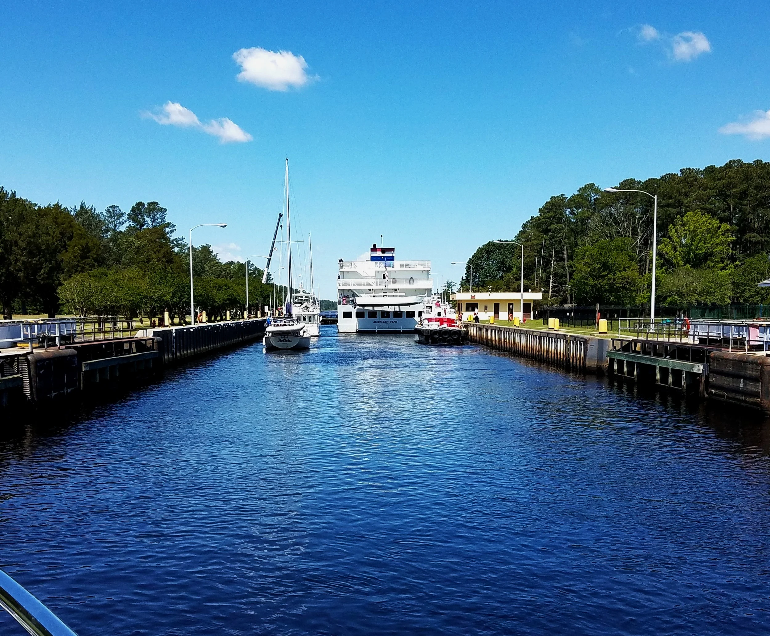 We made the lock entrance. This cruise ship had precedence over all the pleasure craft so we were happy to squeak in.