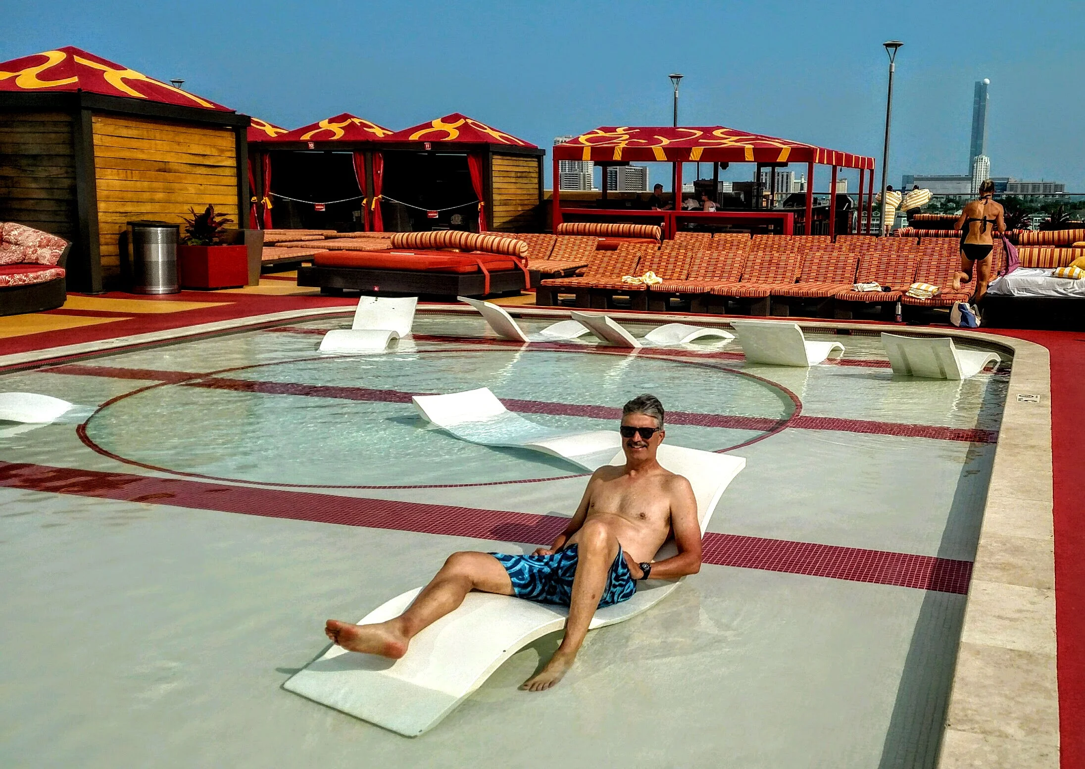 Swimsuit model Owen Doherty enjoying the Golden Nugget Pool. Photo by Larry McCullough