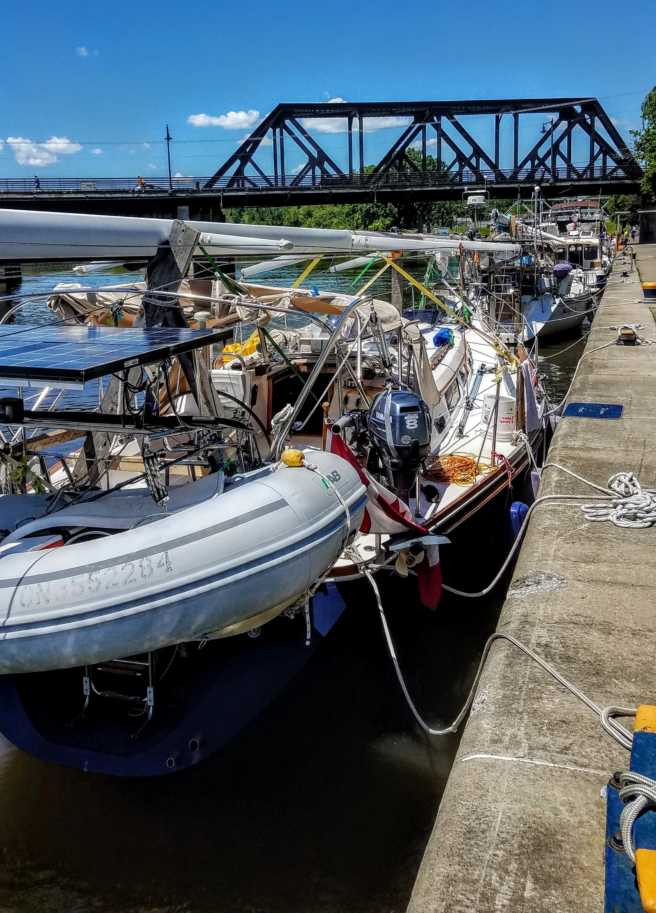 The line of low-profile boats ready to make the trip up the Erie Canal