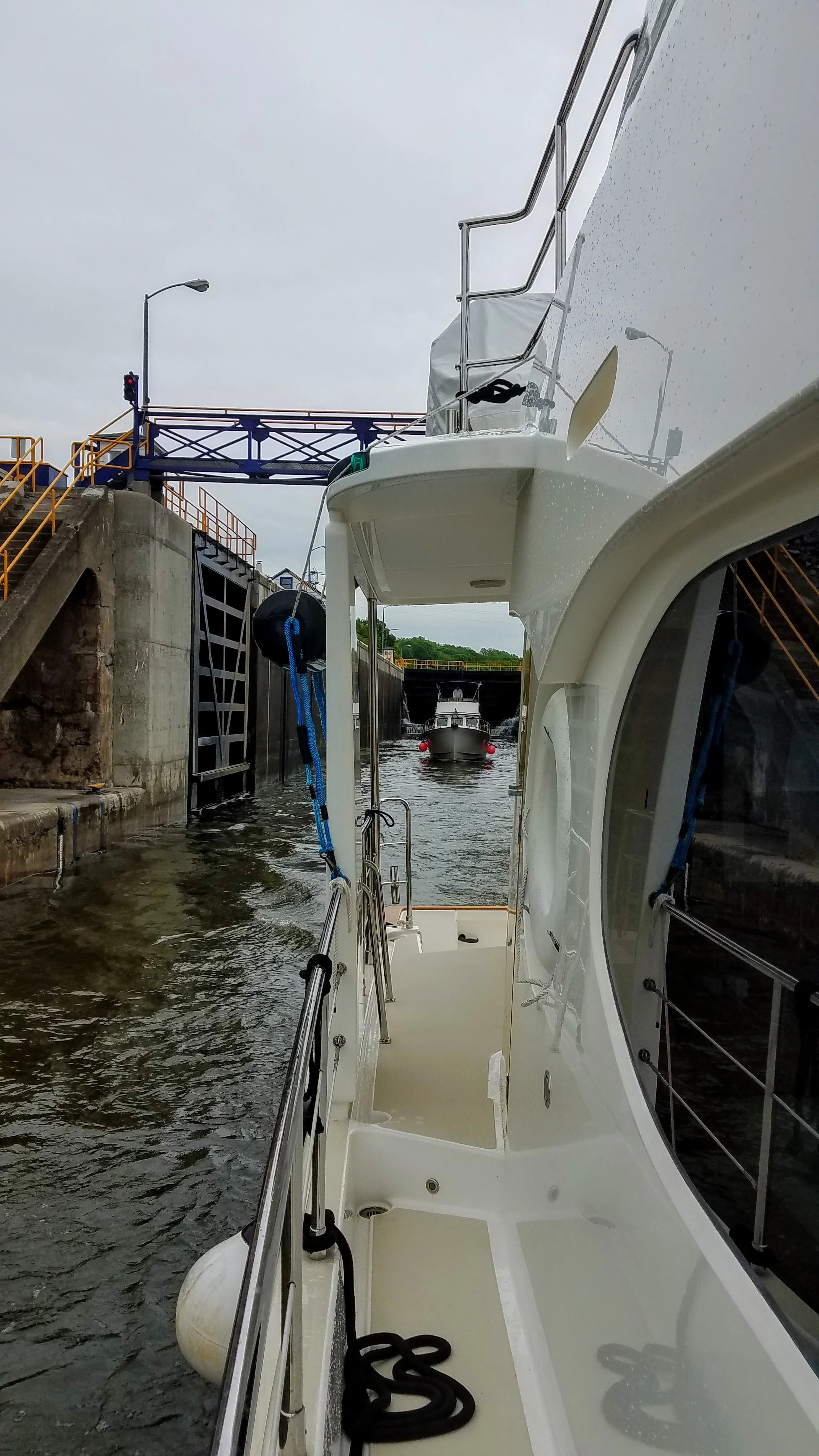 Exiting lock 6 of the Oswego Canal shadowed by the Comet