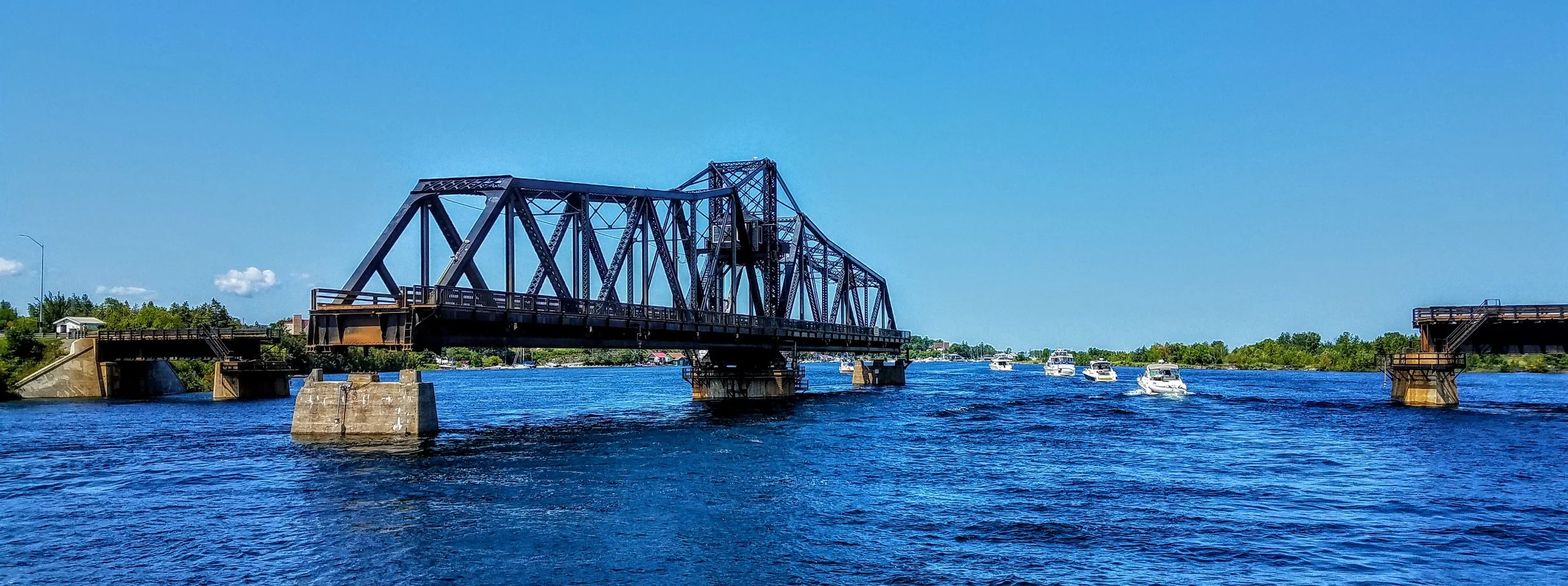 The swing bridge opens on the hour and is right in front of Little Current