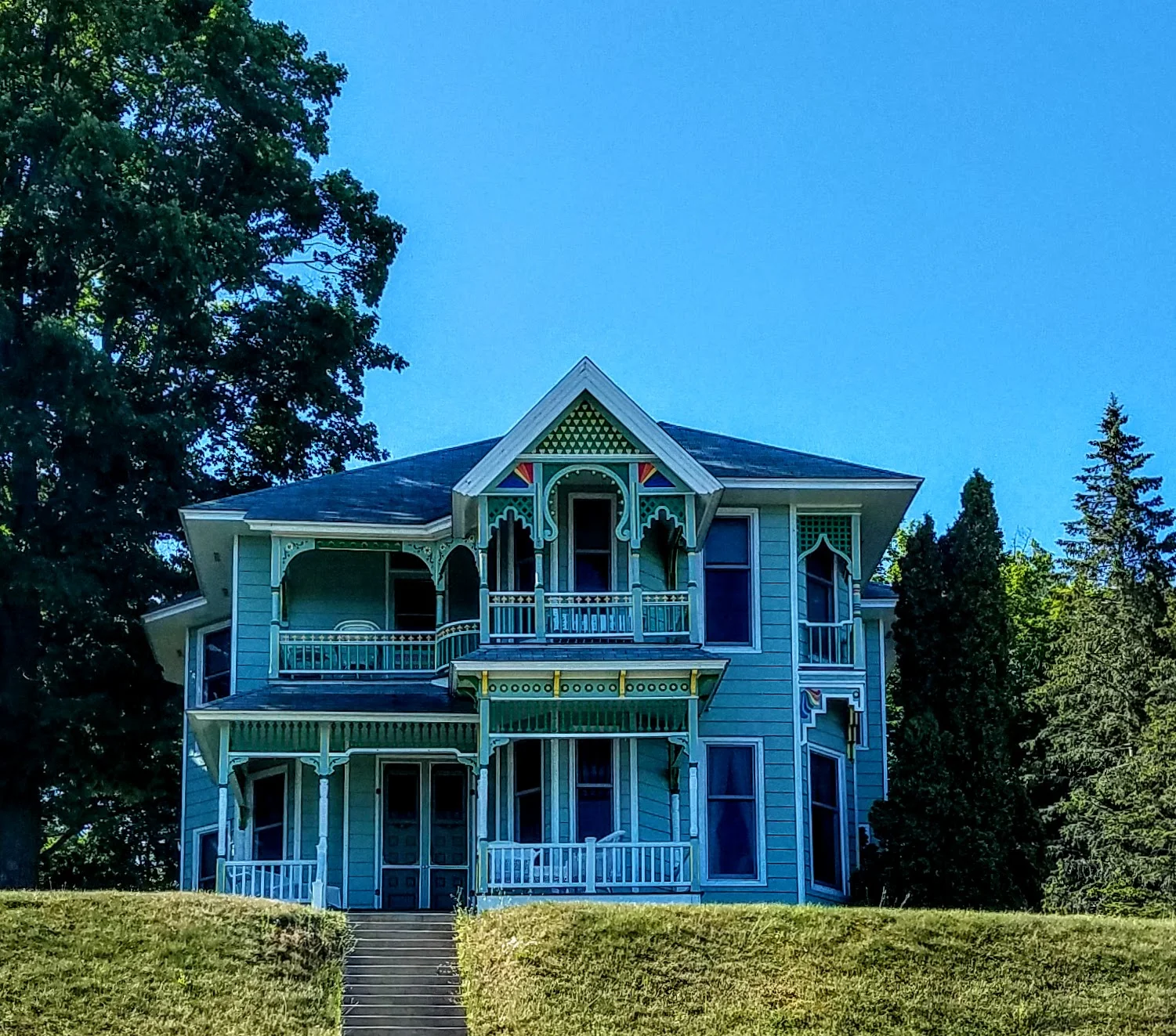 A pretty victorian era house on the bluff above channel