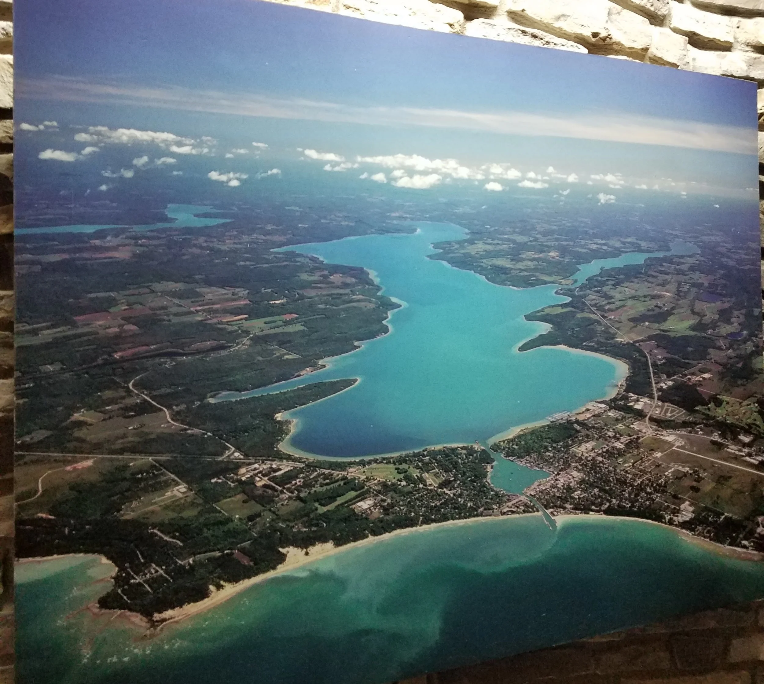 In the foreground is Lake Michigan. The little lake is Round Lake where we are docked. The large lake is Lake Charlevoix with its South Arm.