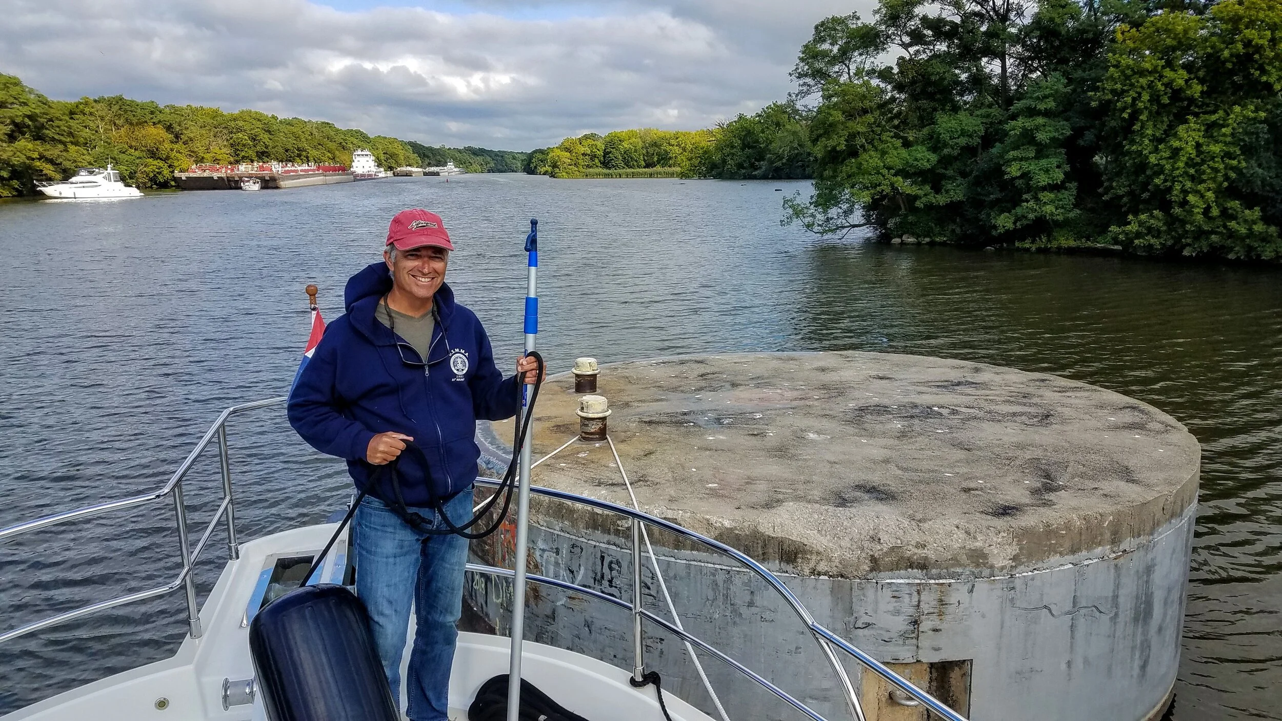 Owen takes watch on the bollard tie while we wait for our lock opening at the Marseilles Lock