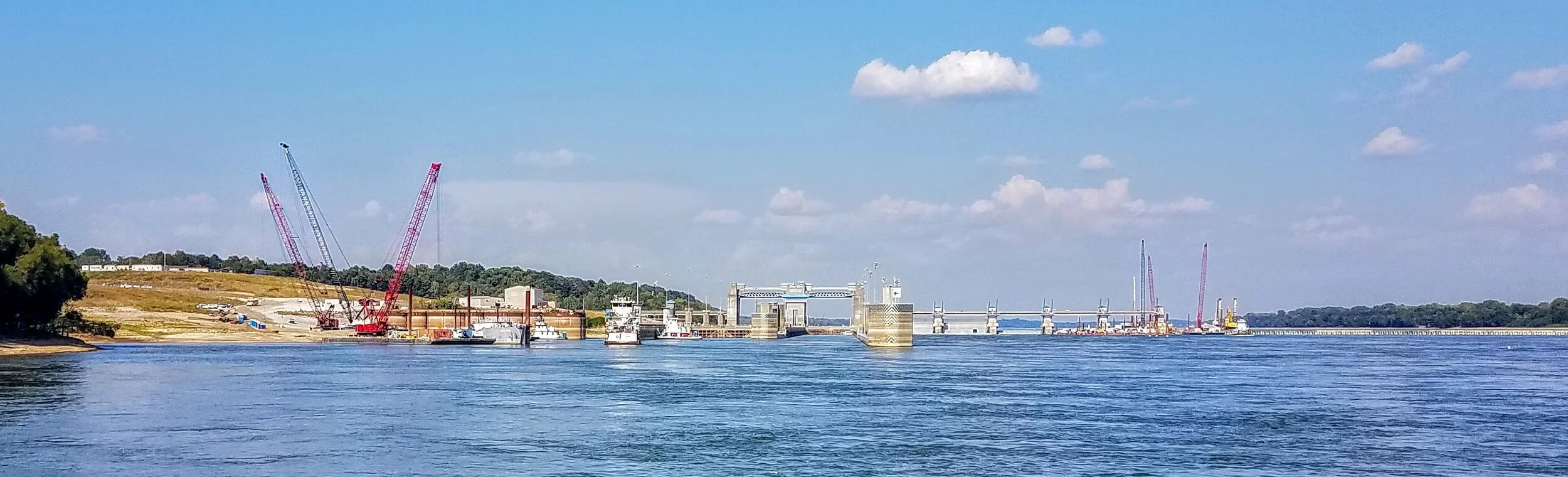 The Olmsted Lock and Dam. This lock & dam took 25 years to build (opening in 2018) and cost 3 billion dollars. It replaces locks 52 and 53 along the Ohio river. We were immediately allowed through and the lift is only eight feet.