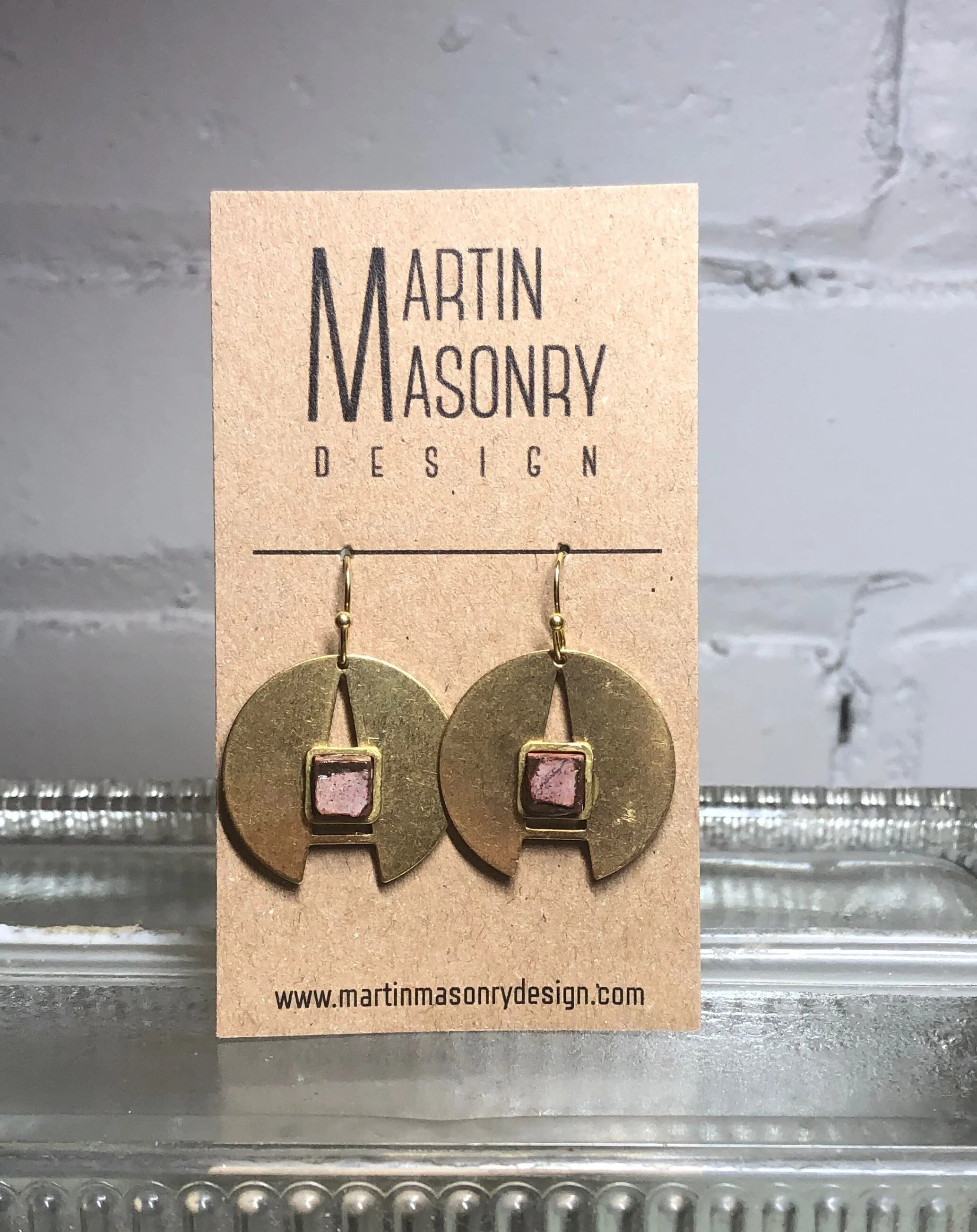 Red cement cubes on brass A rings.jpeg