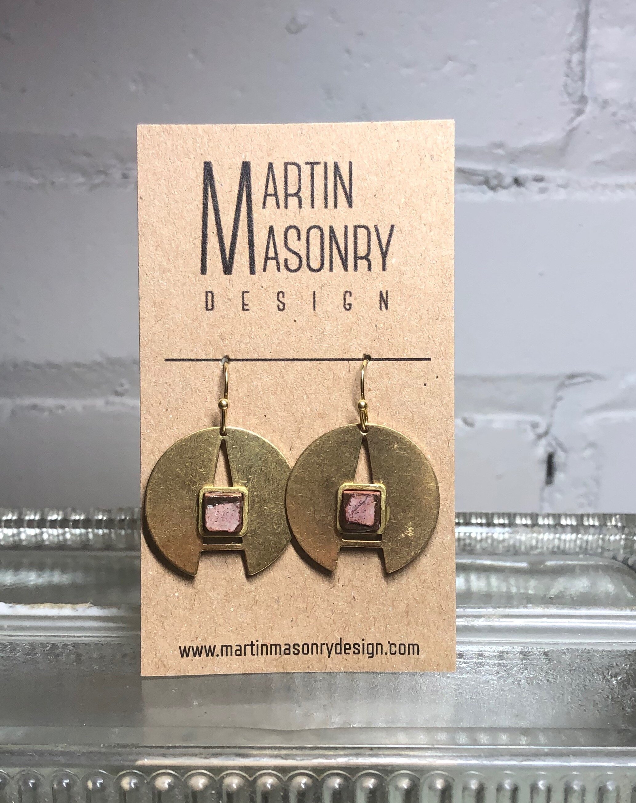 Irregular red cement cubes on A rings