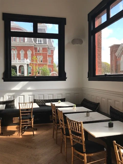 Inside Cafe Otis overlooking City Hall.