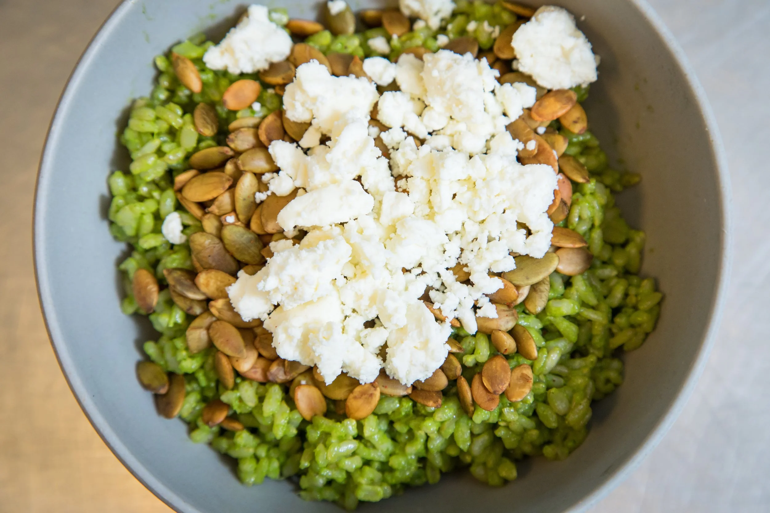 The secret ingredient in Chaia’s green rice is a pesto made from herb stems. Photo by Amanda Joy Photographics