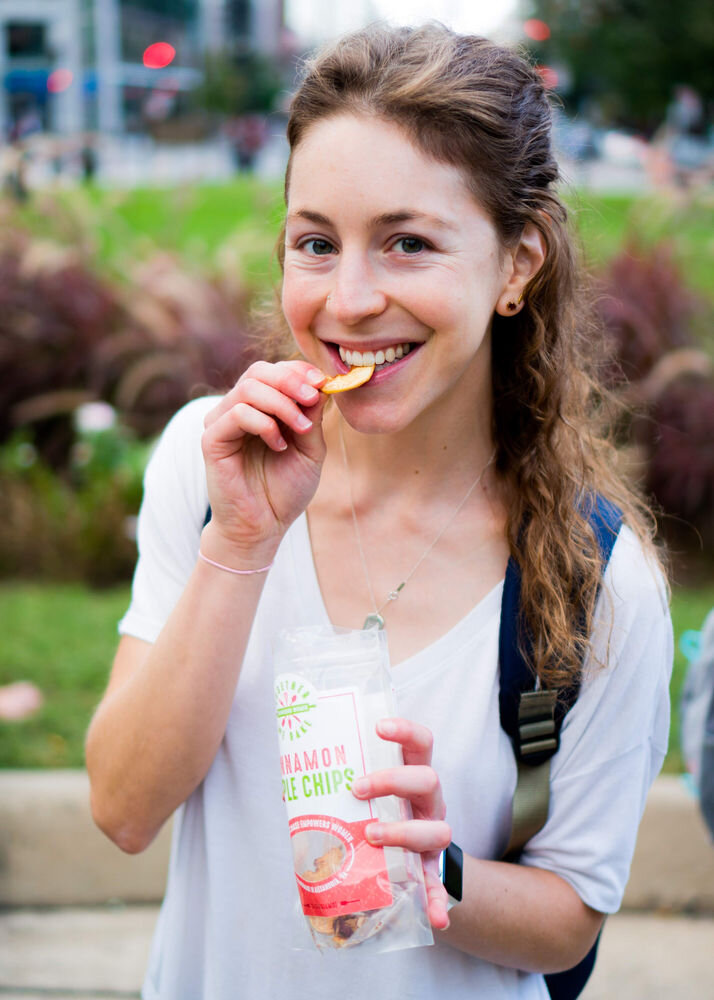 Enjoying Fruitcycle chips on the RescueDish walking tour.jpeg