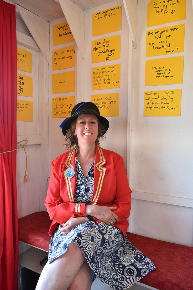 Rose Turtle Ertler in the doorway of The Complimentary Caravan Photo | Emma Hodgkinson