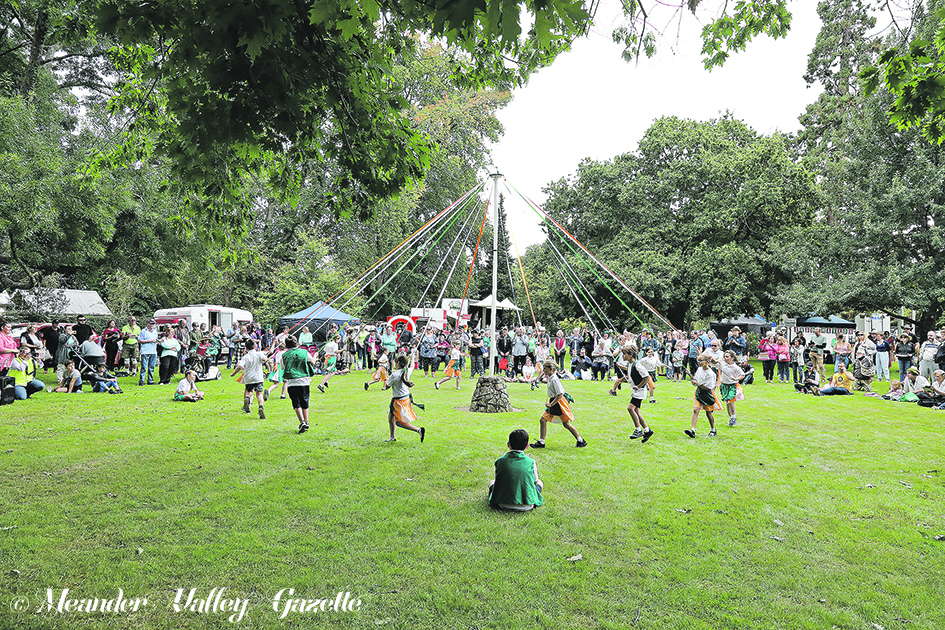 Westbury Primary School enjoying traditional maypole dancing in front of an appreciative audience on the Village Green. Photos | Mike Moores