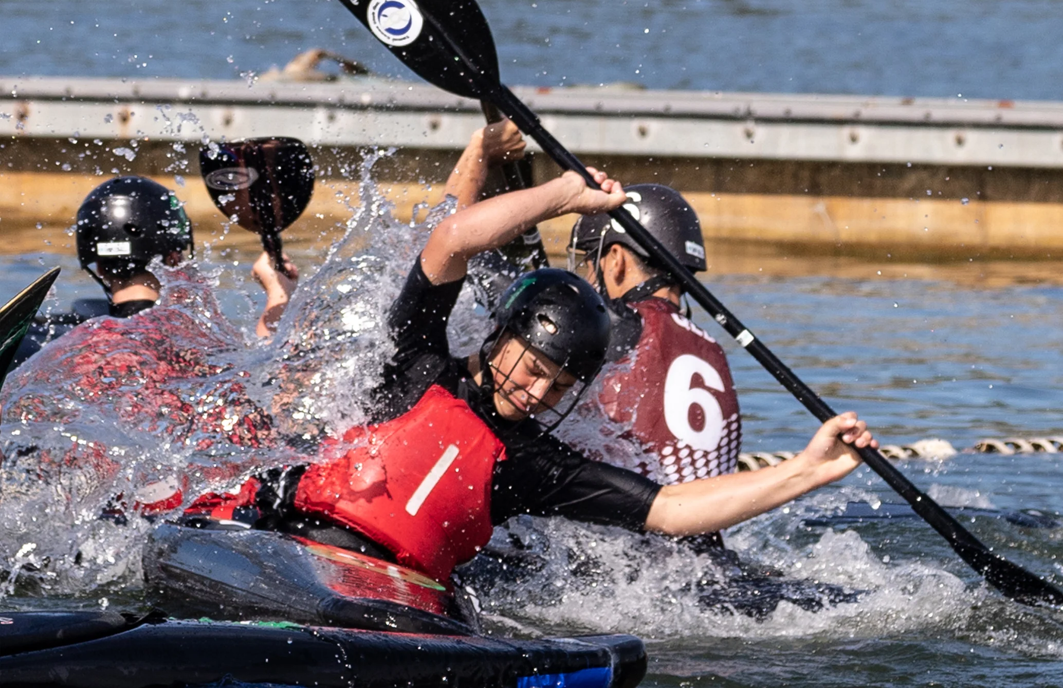 The team in action against a strong attack from Queensland A during the National Canoe Polo Championships at Penrith. Photo by Teresa Wilson