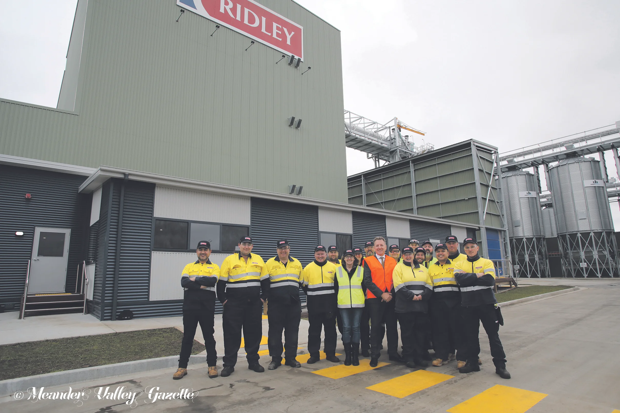 CEO David Lord, (orange vest), manager Johnny Cabercas (far left) and some of the local workers now employed by Ridley at Westbury. Photo by Mike Moores