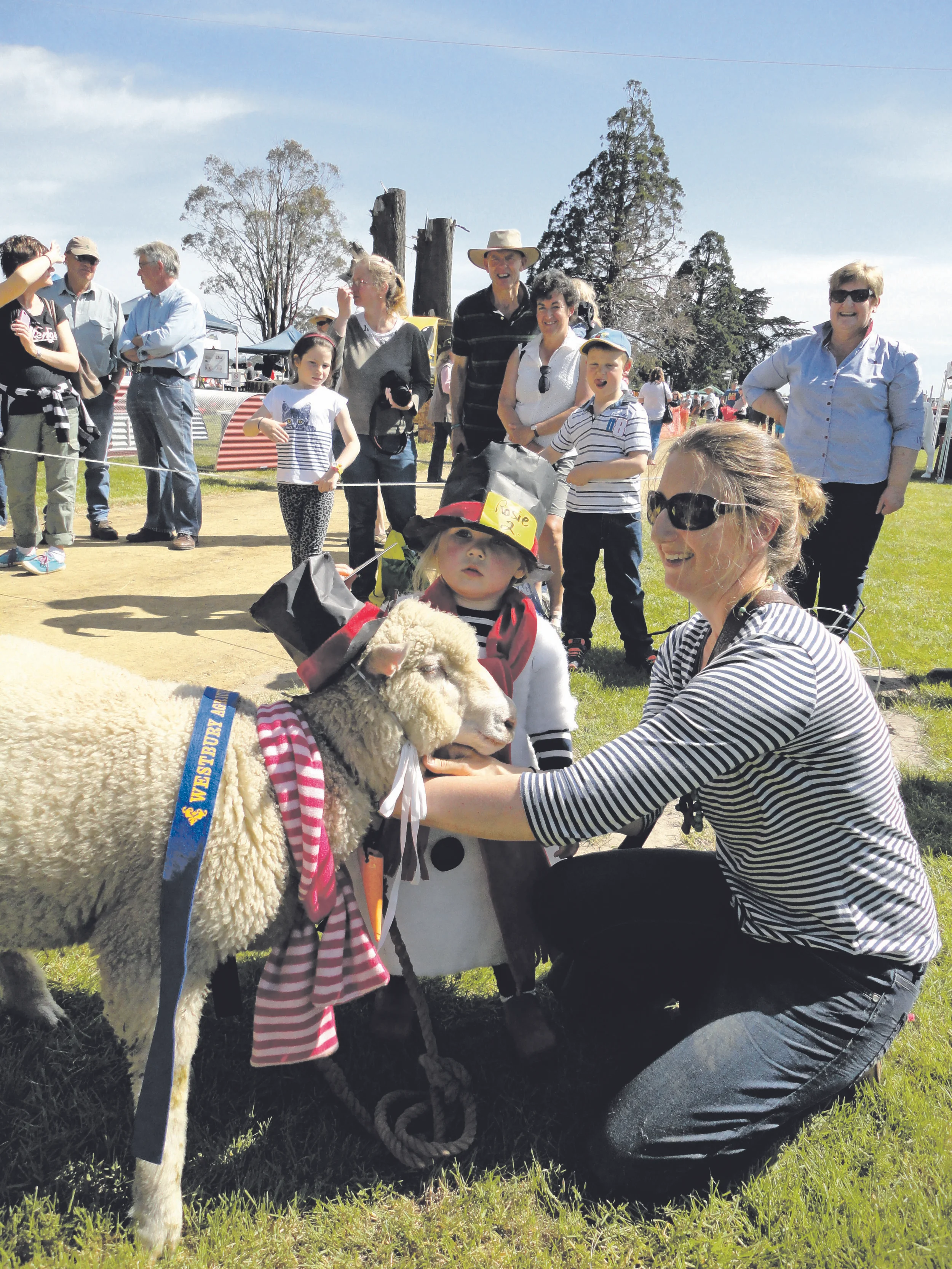 Photo supplied Kate and Rosie Chugg with their prize winning sheep at the Westbury Show.