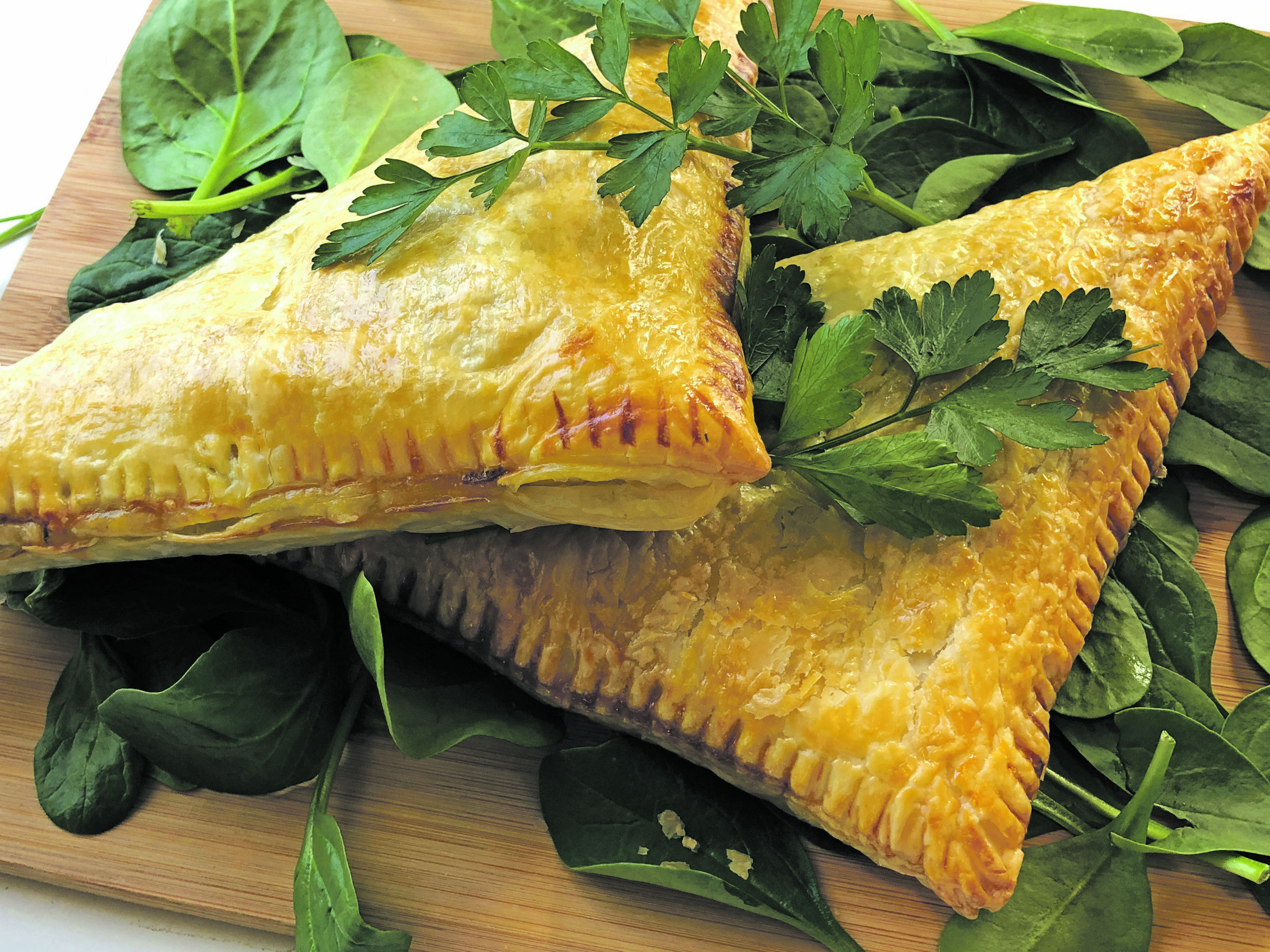 Photo by Wai Lin Coultas Giant savoury turnovers, brimming with delicious salami, veg and cheese for a shared lunch in a busy working week.