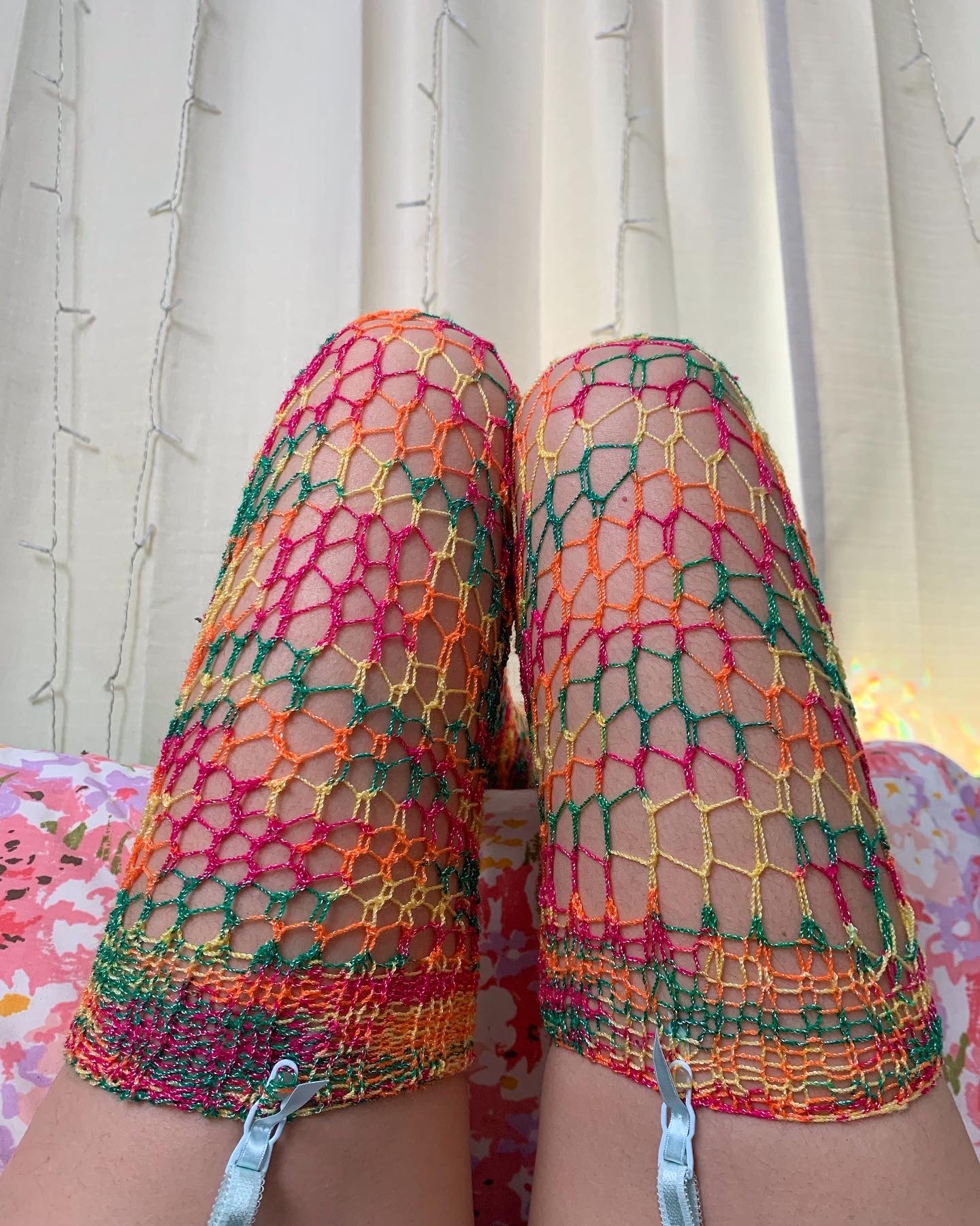 Handknit rainbow fishnet stockings