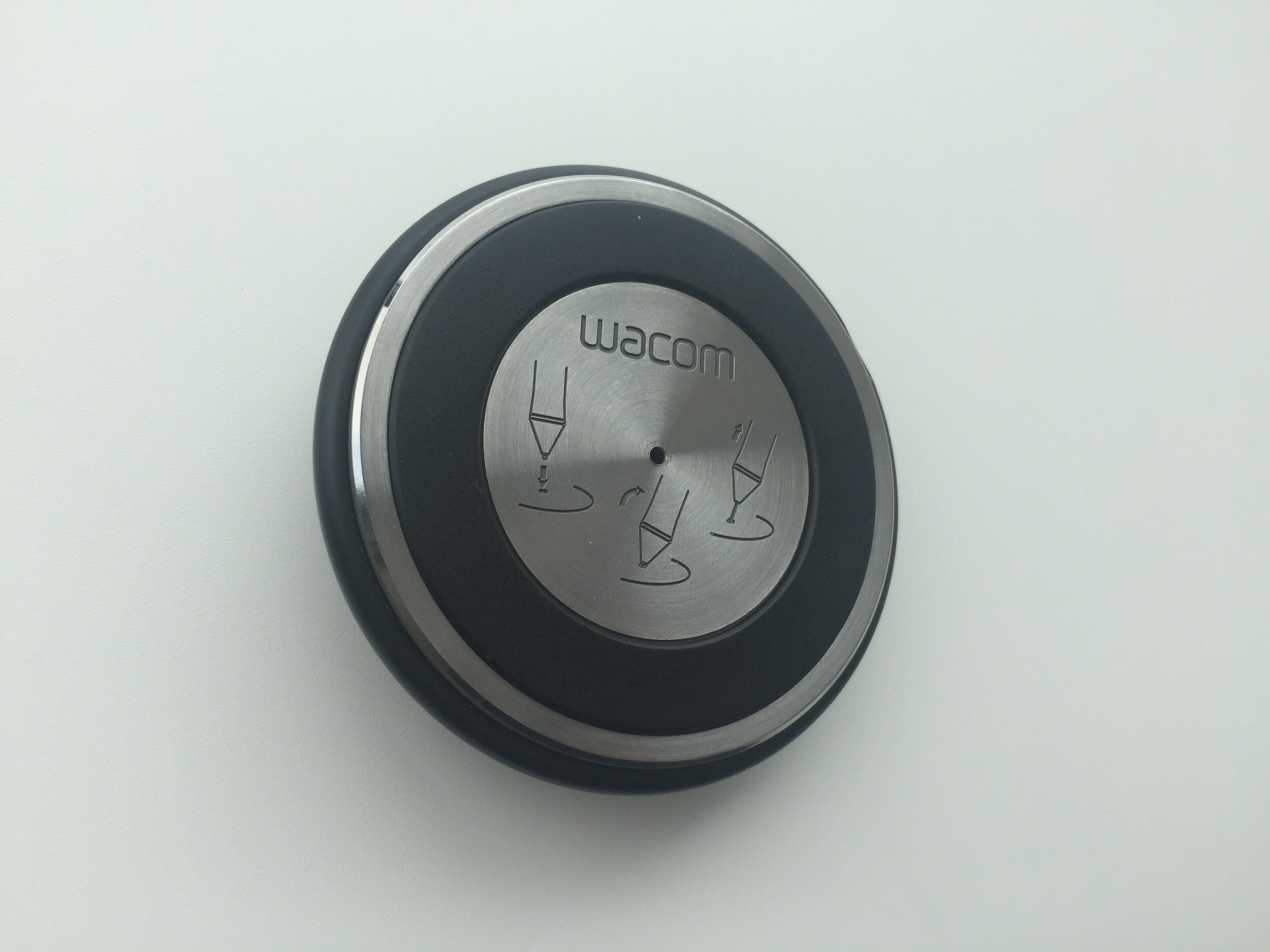  The previous pen stand had a steel weight completely hidden inside a plastic housing. The concept of the new design was to bring this metal weight to become a beautiful cosmetic bottom surface as well as having a stabilising function. We used a spin