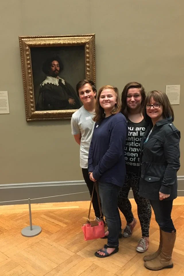 Mindy and her family in front of The Juan de Pareja painting at the Met.