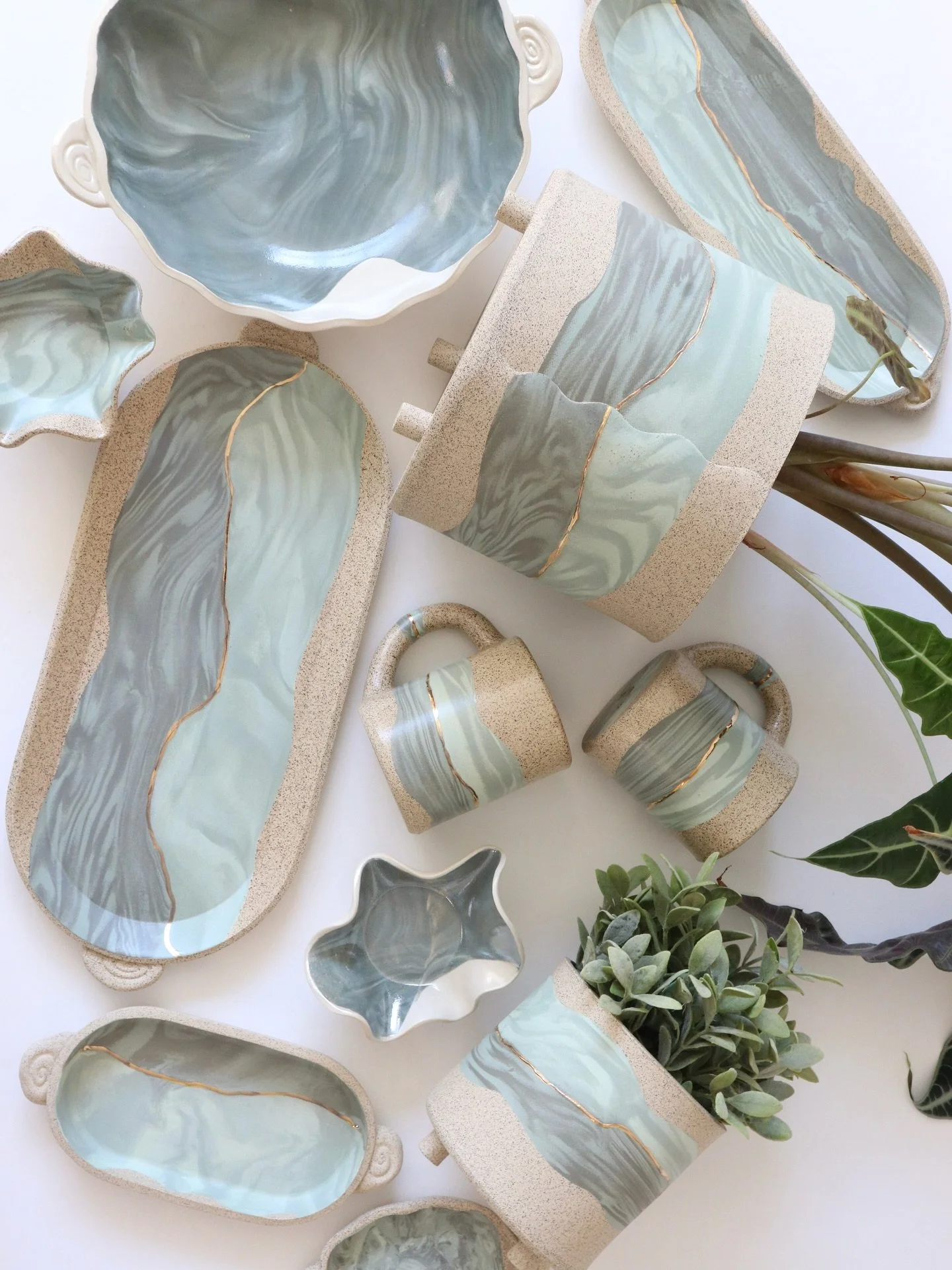 A group snap of some of my pieces in one of my favorite color-ways.🌊 
Formed using nerikomi &amp; inlay techniques with colored clay that I&rsquo;ve hand tinted to create my palette.