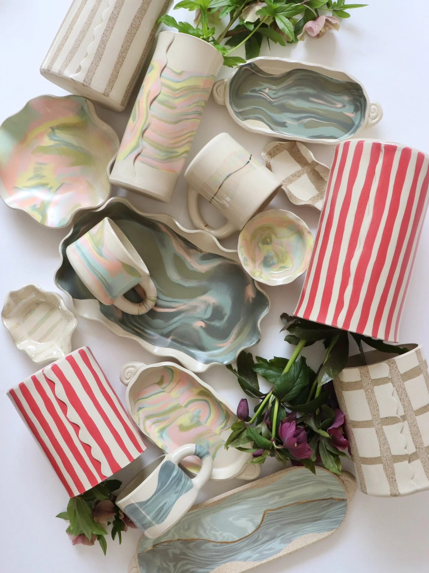 A #flatlay for you! I&rsquo;ve been cooking up an assortment of lovely #nerikomi/inlay pieces for a few Spring Markets! Here is a peek at a small selection.🤍
☀️This THURSDAY 9-3pm in Philly @urbncommunity Building 543, 5000 South Broad Street 19112 